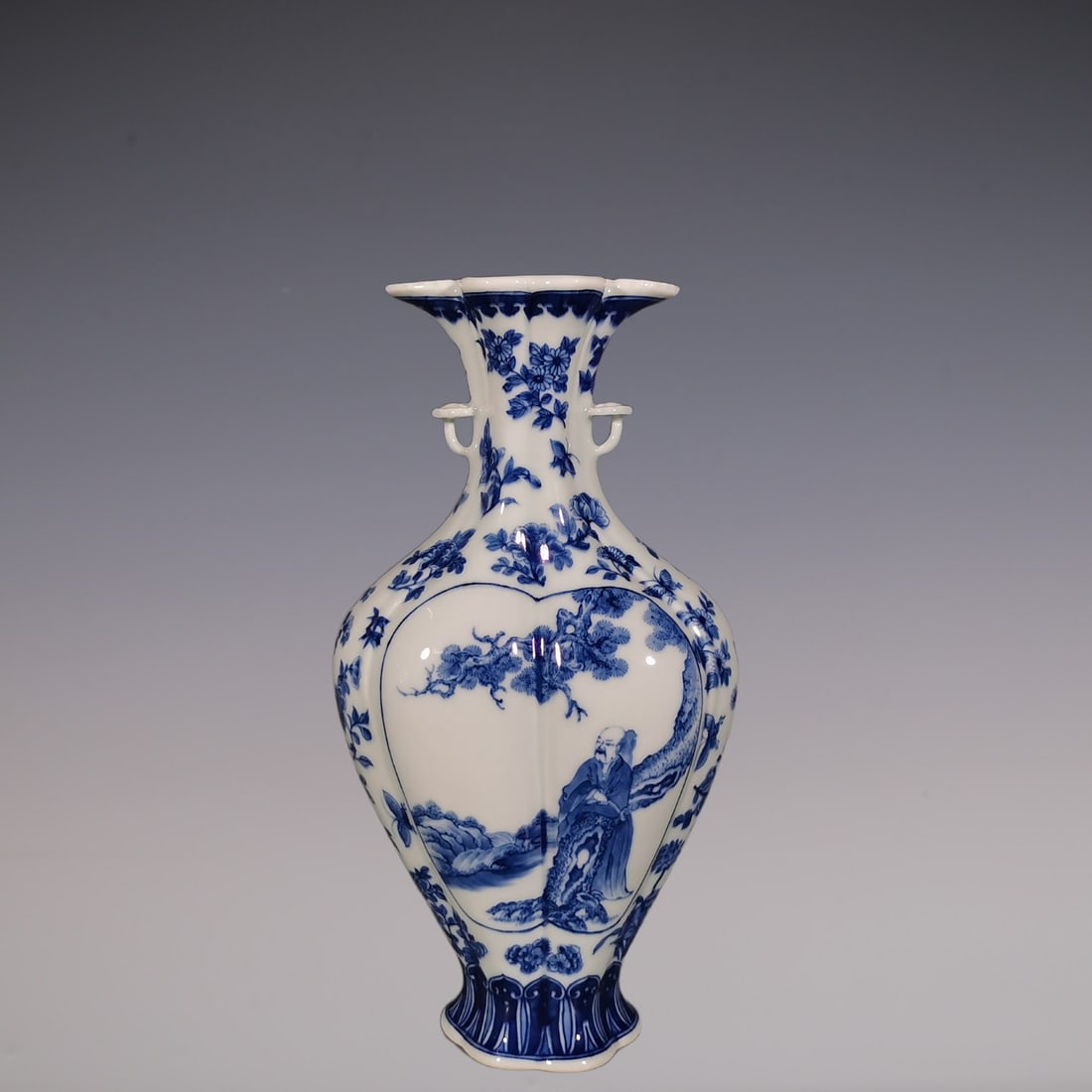 An Exquisite Blue and White Flower Pattern Character and Story Pattern Double-Ears Vase: An Exquisite Blue and White Flower Pattern Character and Story Pattern Double-Ears Vase Qing Dynasty, China Yongzheng Six-character Mark Size:28cmx15.5cm (The Dimensions Of All Batches Are Manually Me