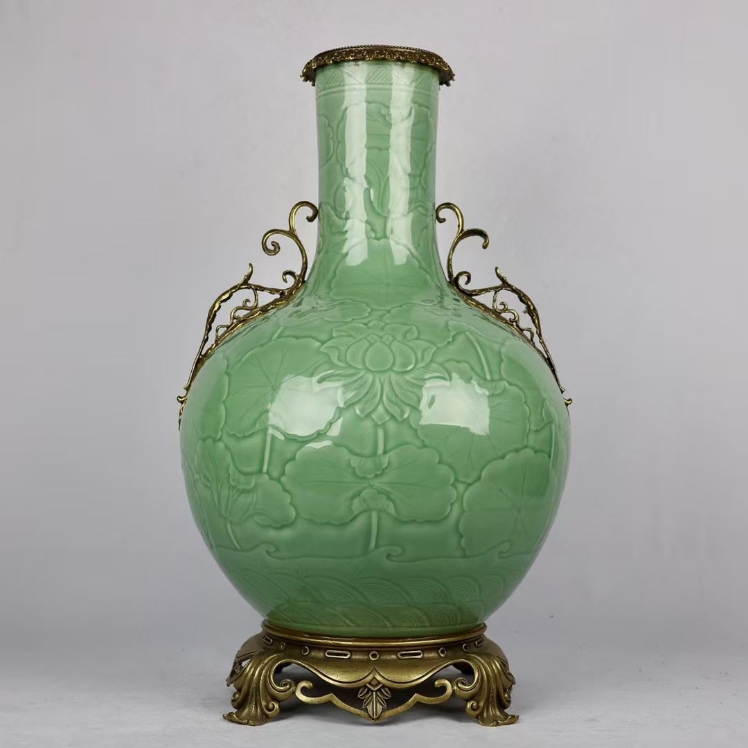 An Exquisite Shadow Blue Glaze Inlaid Bronze Flower Pattern Double-Ears Vase: An Exquisite Shadow Blue Glaze Inlaid Bronze Flower Pattern Double-Ears Vase Qing Dynasty, China Qianlong Six-character Mark Size:61cmx37cm (The Dimensions Of All Batches Are Manually Measured.If You