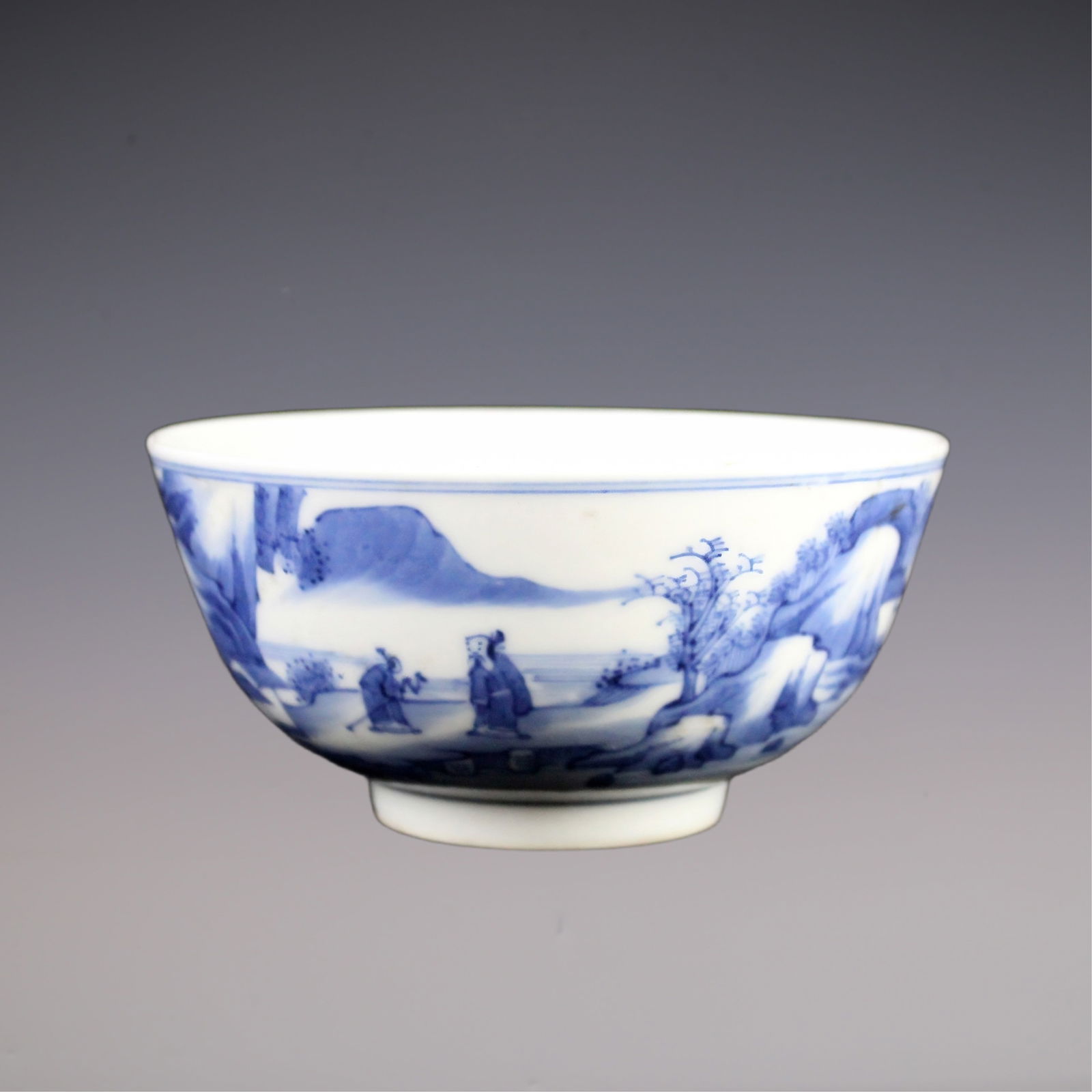 An Exquisite Blue and White Landscape and Figure Pattern Bowl: An Exquisite Blue and White Landscape and Figure Pattern Bowl Qing Dynasty, China Kangxi Six-character Mark Size:12cmx5.5cm (The Dimensions Of All Batches Are Manually Measured.If You Need More Detail