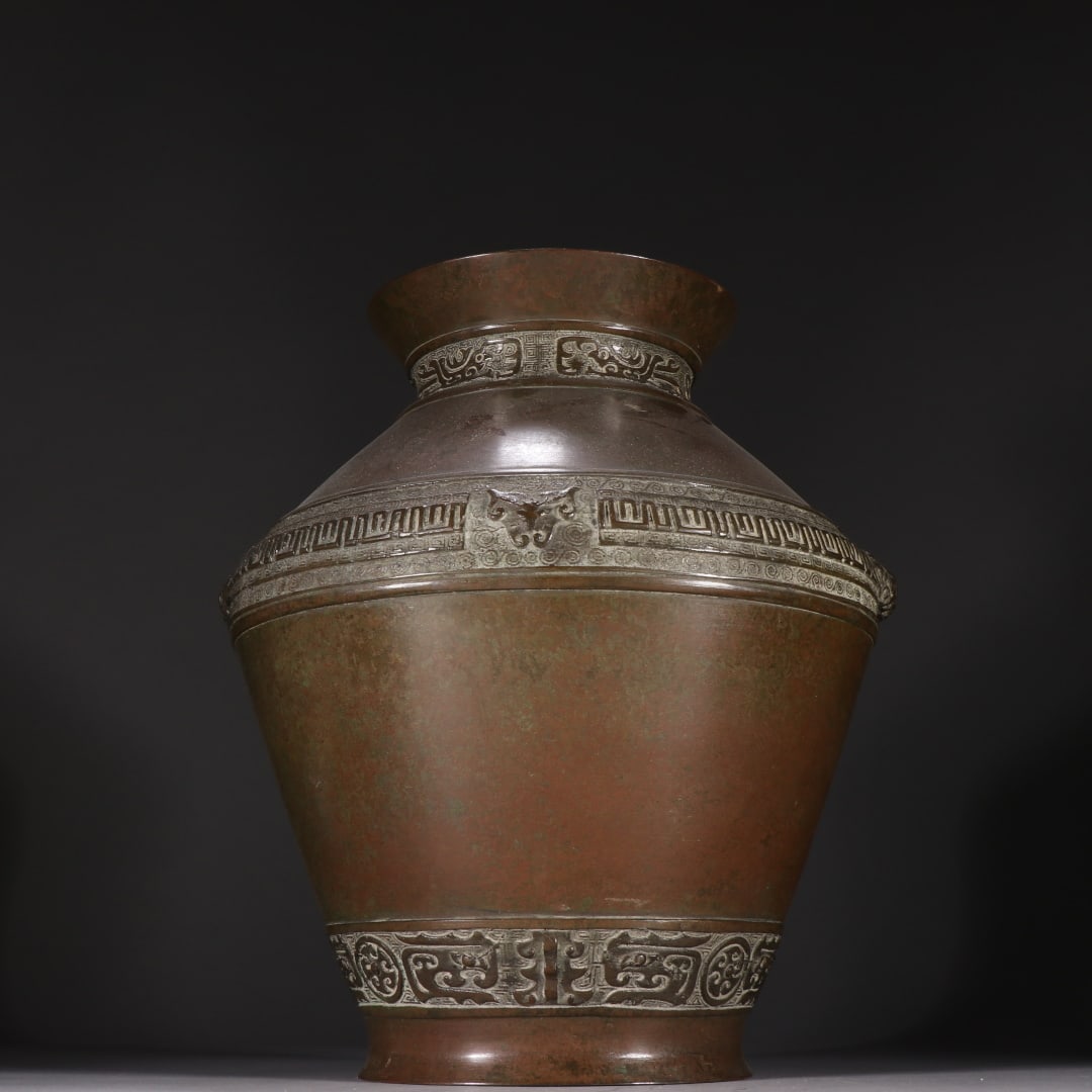 A copper animal ear bottle from the Qing Dynasty (1 of 9)