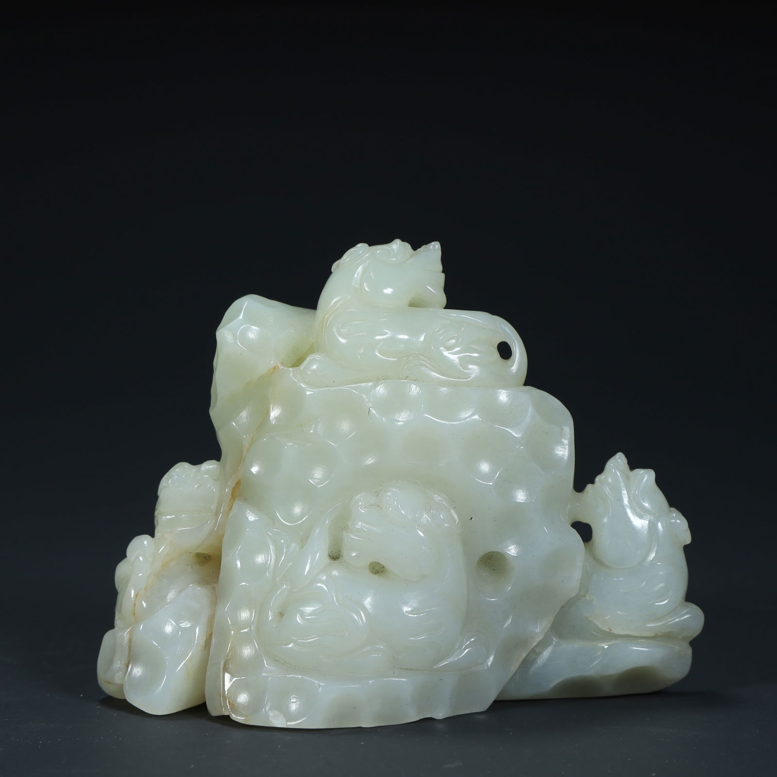 A Qing Dynasty Hetian white jade carving group dragon playing mountain ornament: Qing Dynasty Hetian white jade carving group dragon playing mountain ornament Size:H:8cmL: 10.5cmW:5.5cmW:434g (The Dimensions Of All Batches Are Manually Measured.If You Need More Detailed Informatio