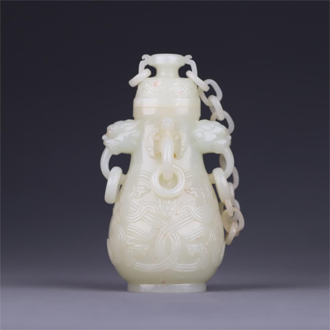 A Qing Dynasty Hetian jade live ring chain dragon pattern lid bottle: Qing Dynasty Hetian jade live ring chain dragon pattern lid bottle Size:H:14.17.15.7cmW:0.3909kg (The Dimensions Of All Batches Are Manually Measured.If You Need More Detailed Information, Please Cont