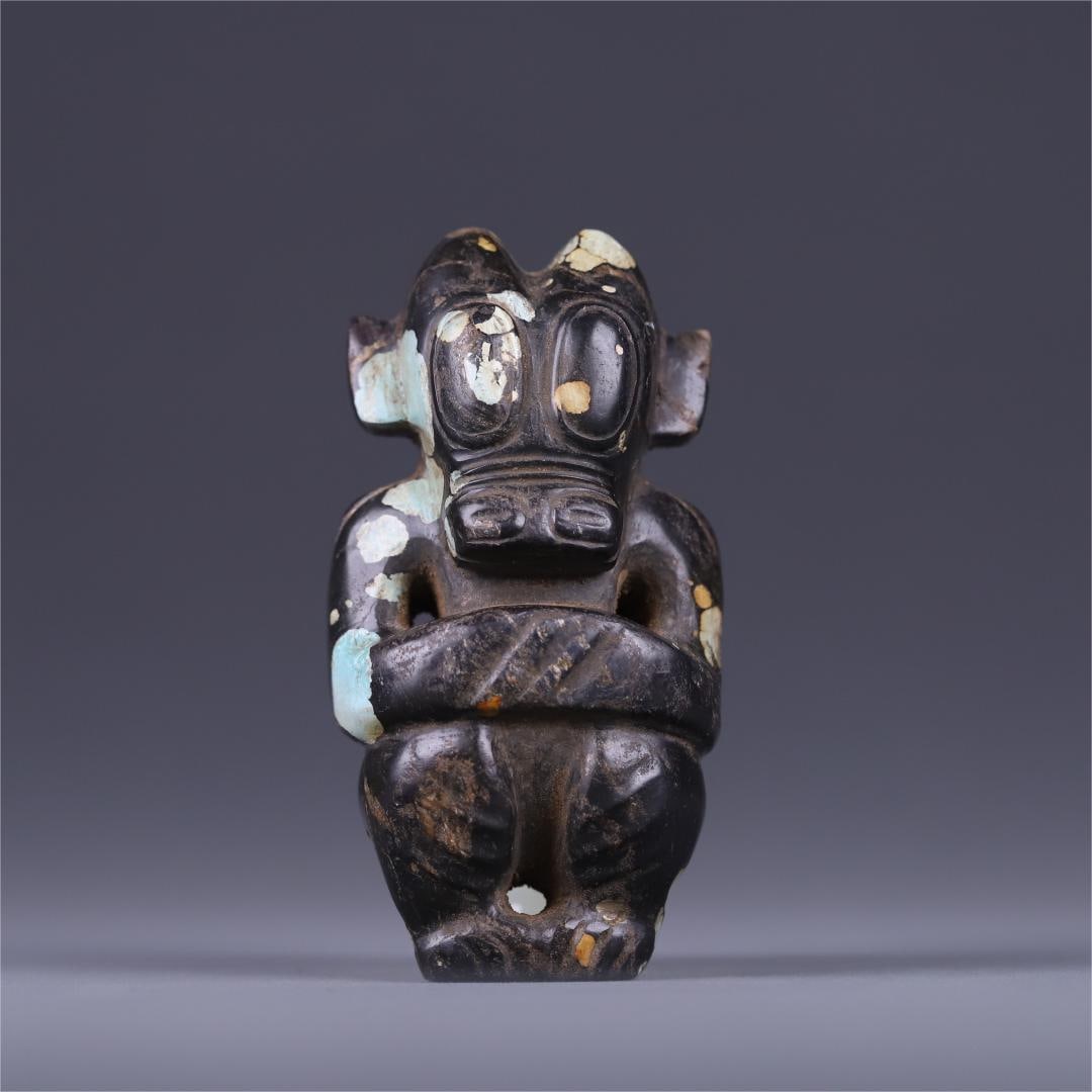 A beautiful ancient jade turquoise sun god carving (1 of 9)