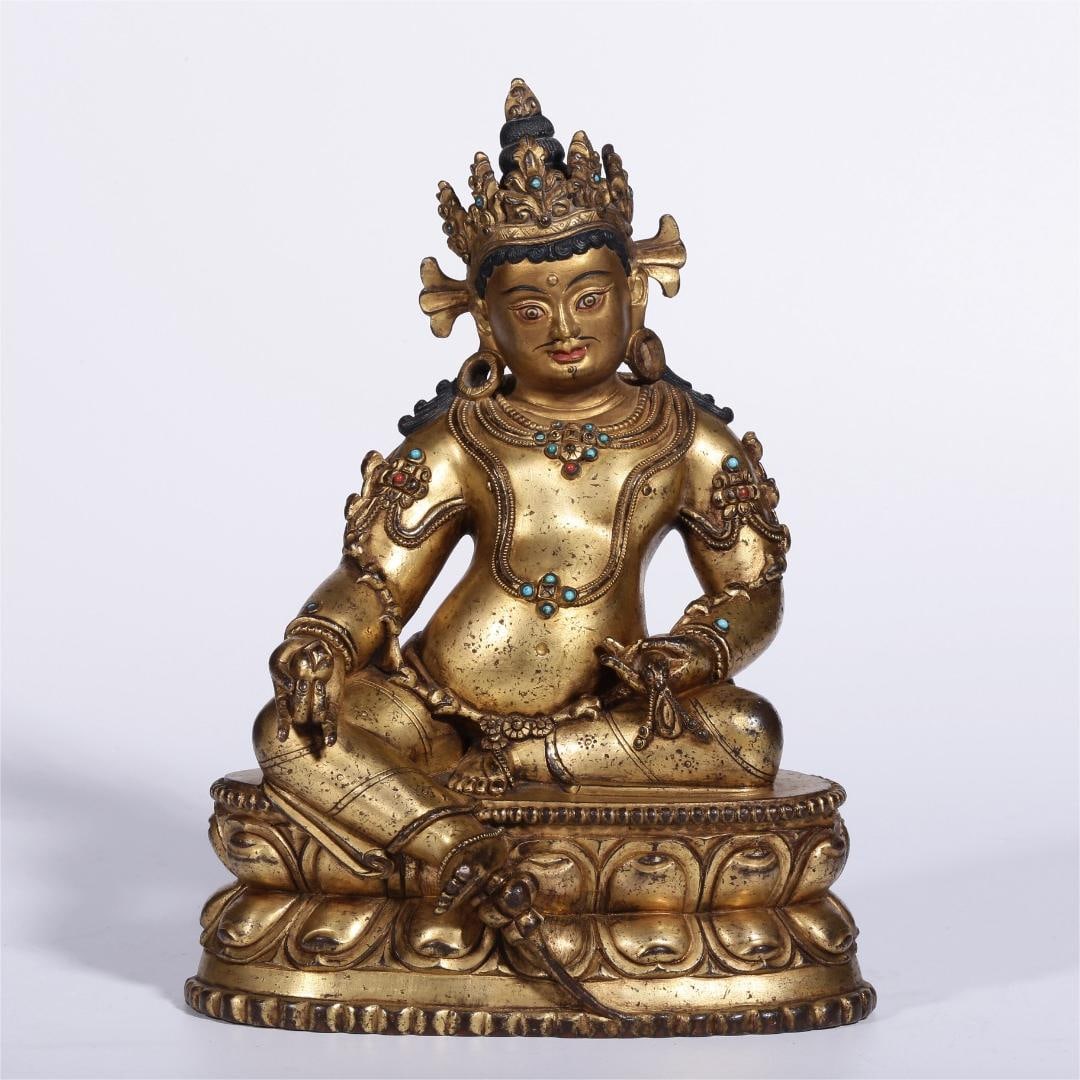 A seated statue of the God of Wealth in copper gilt gold from the Qing Dynasty: The bronze gilt yellow God of Wealth seated statue of the Qing Dynasty Size:H:20.5cmL:15.5cmW:9.5cmW:2.082kg (The Dimensions Of All Batches Are Manually Measured.If You Need More Detailed Information,