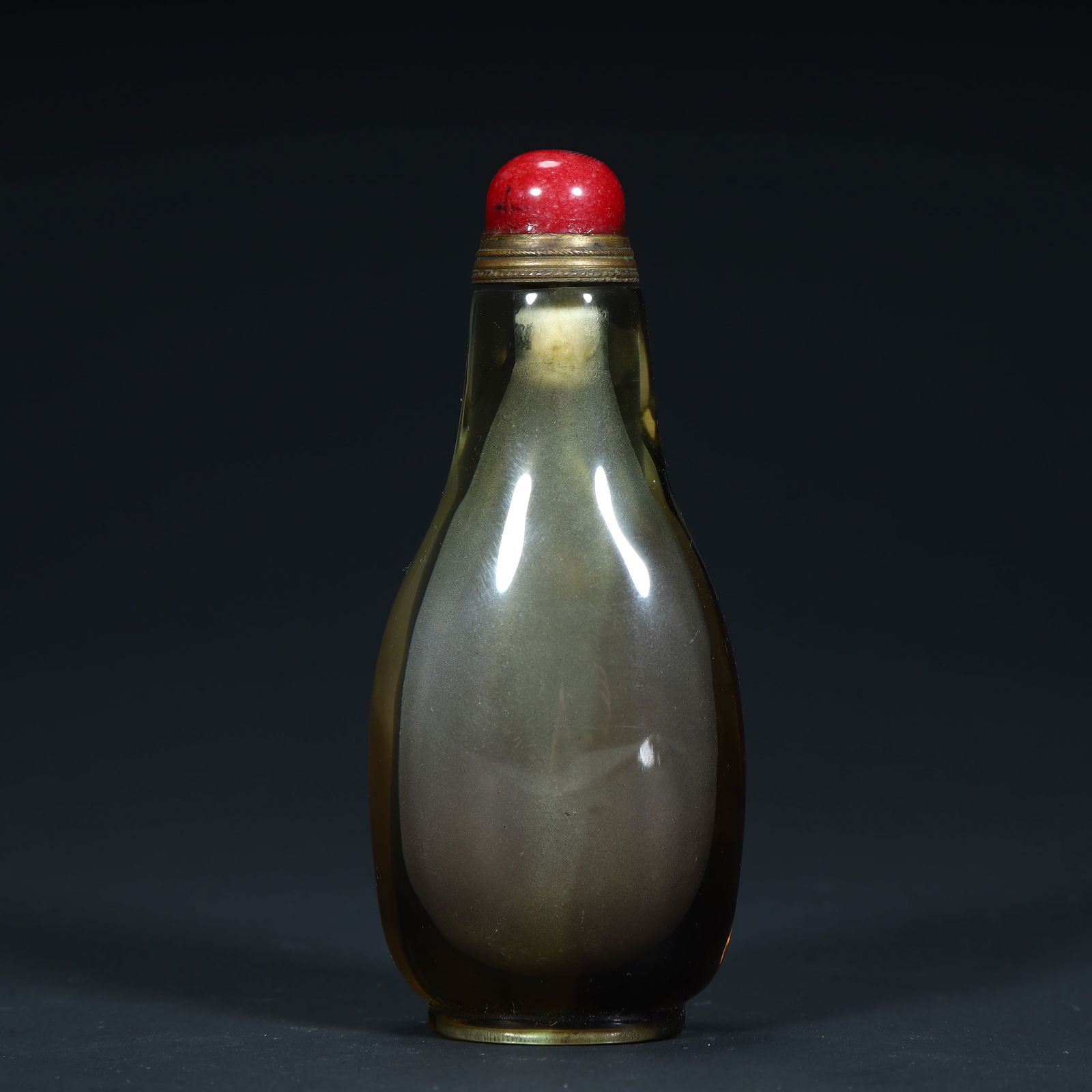 A Qing Dynasty tea crystal plain snuff bottle (1 of 8)
