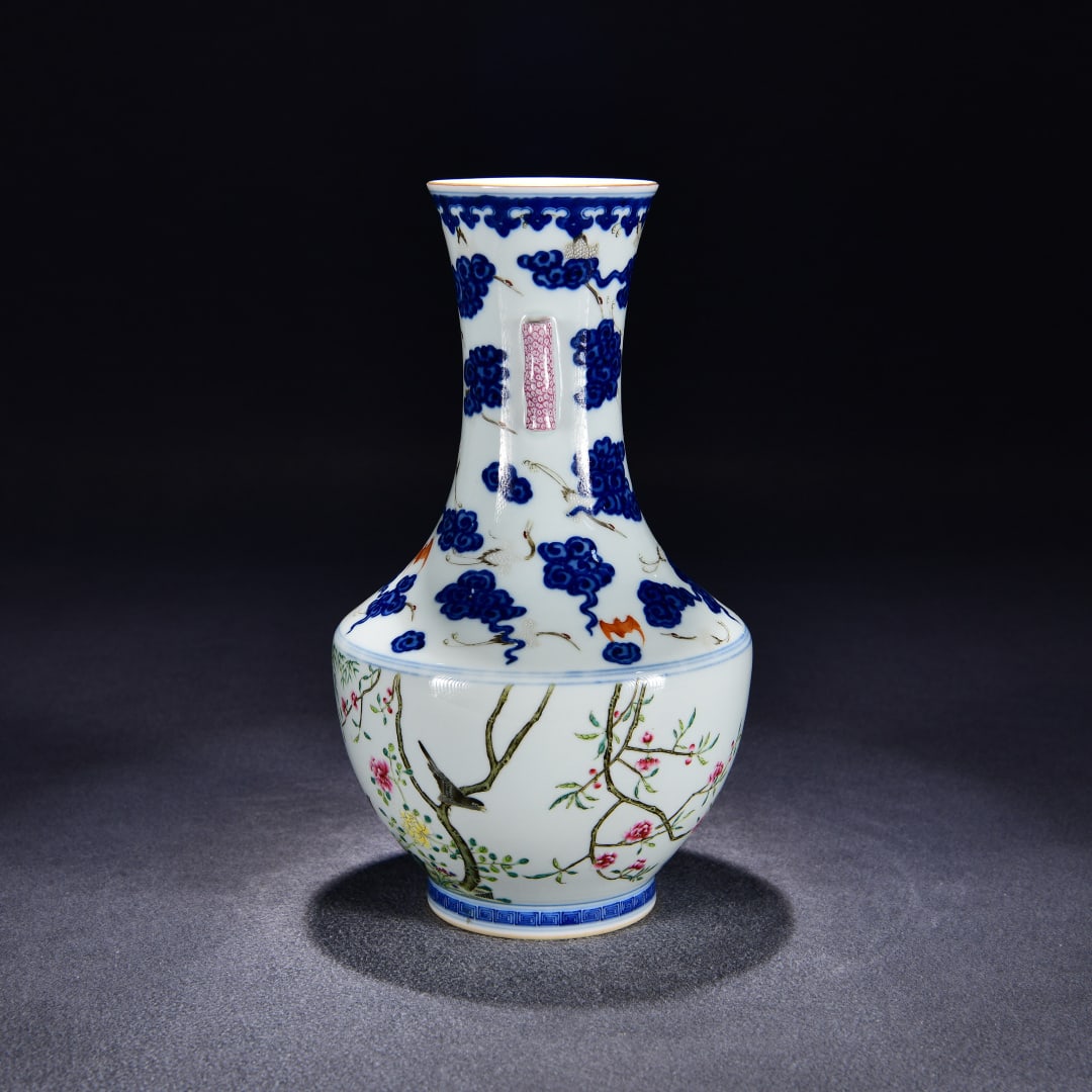 A blue flower pastel flower and bird picture scroll ear bottle made in the Qianlong period of the: Qing Dynasty Qianlong year blue pastel flower and bird picture scroll ear bottle Size:H:32cmW:20cm (The Dimensions Of All Batches Are Manually Measured.If You Need More Detailed Information, Please Co