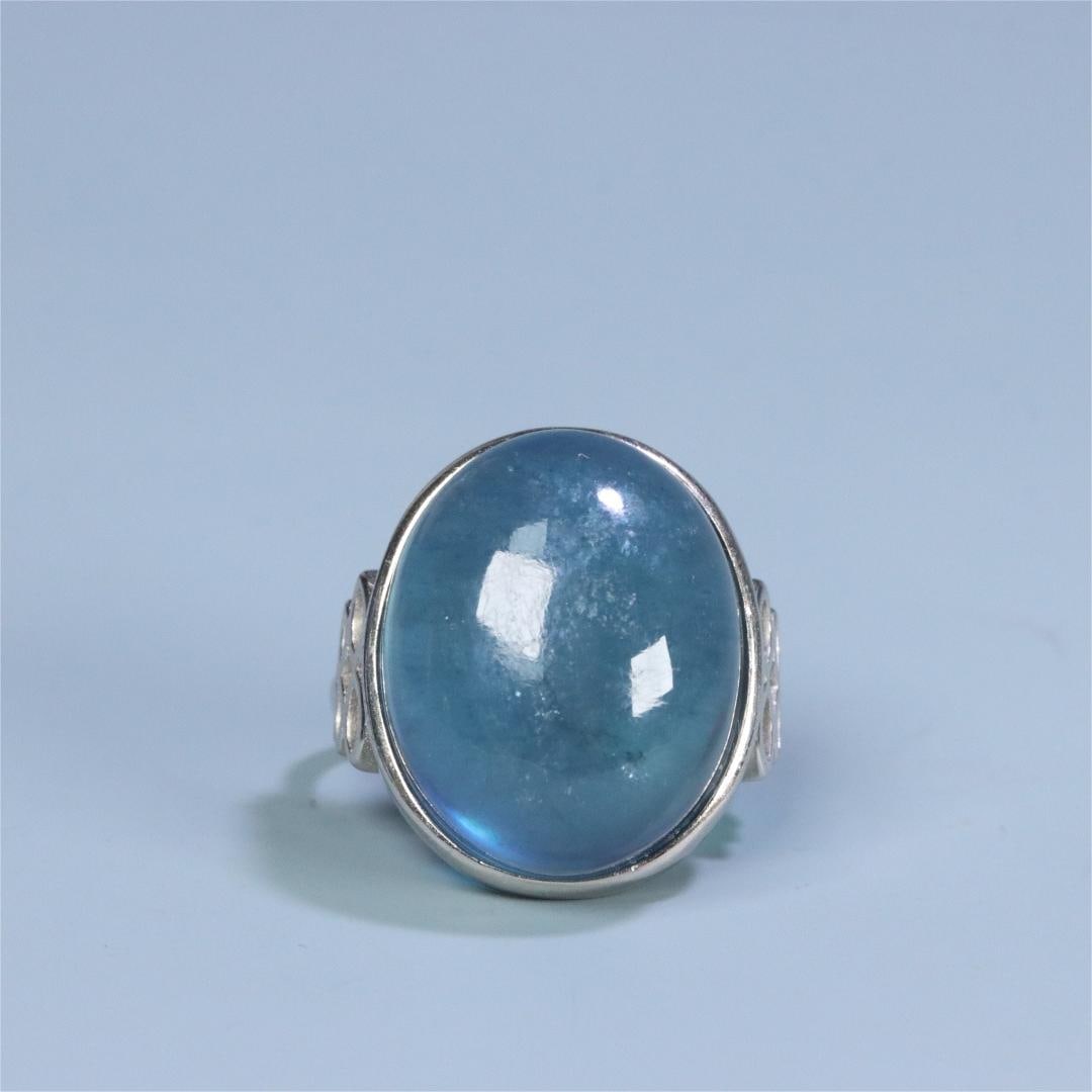 A beautiful silver set aquamarine ring on the face (1 of 8)