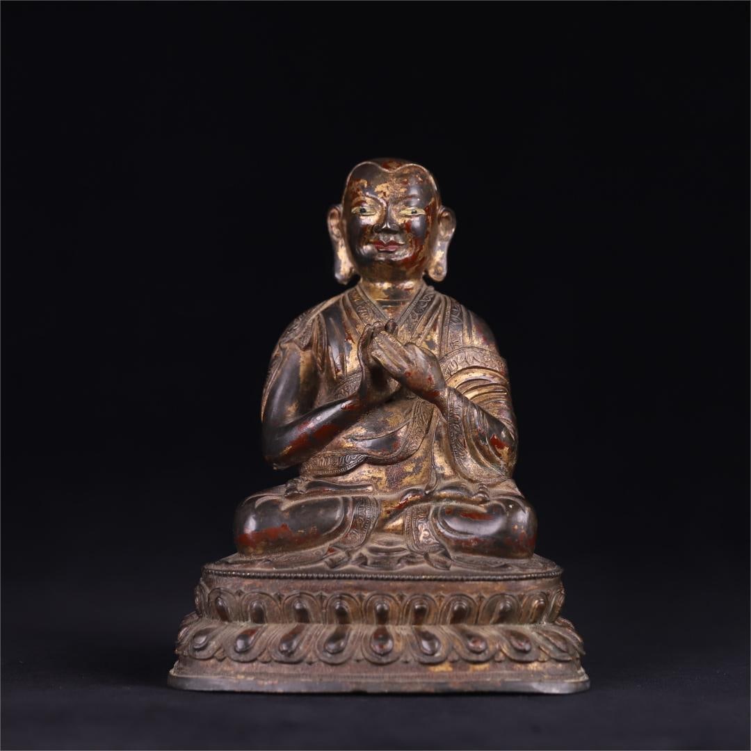 A seated statue of a copper-lacquered gold Arhat from the Qing Dynasty (1 of 9)