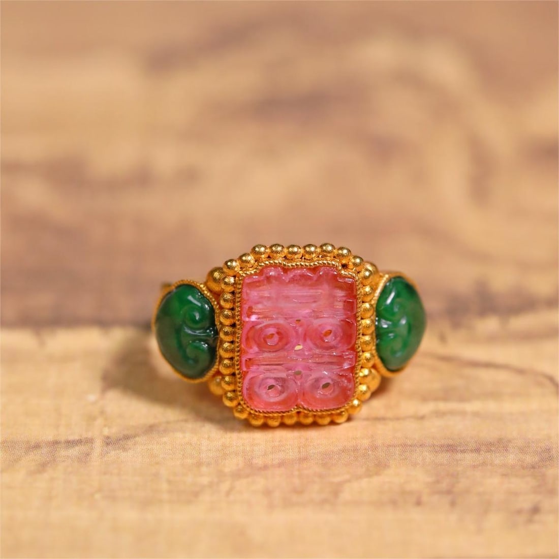 A silver-gilt three-stone ring for the foreign exchange earning period (1 of 4)