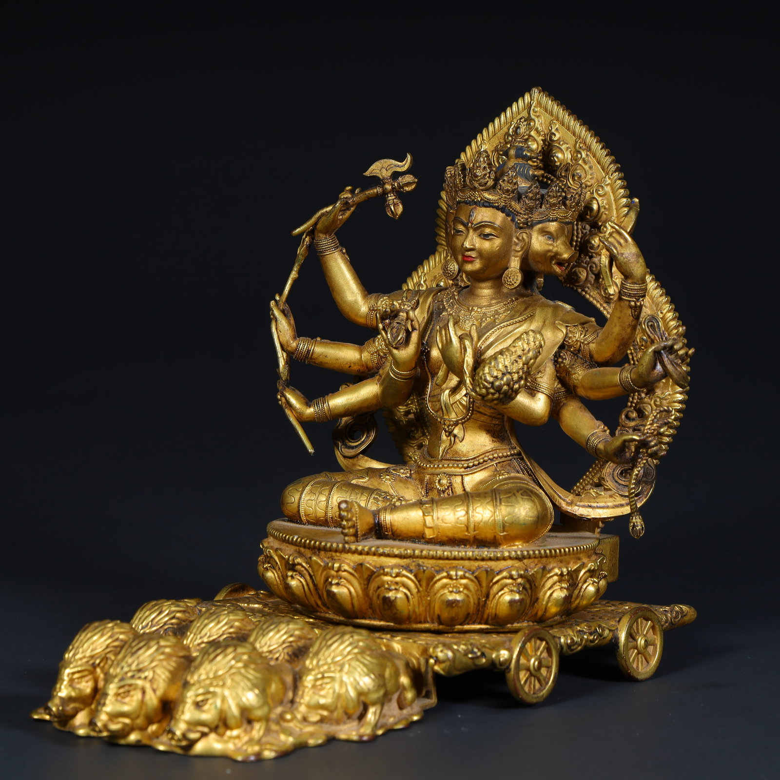 A Qing Dynasty bronze gilt statue of Morizhitian: Qing Dynasty copper gilt statue of Morizhitian Size:Buddha:H:13cmL: 12.5cmW:10cmW:1322g?With base:L: 17cmW:9.5cm (The Dimensions Of All Batches Are Manually Measured.If You Need More Detailed Informat