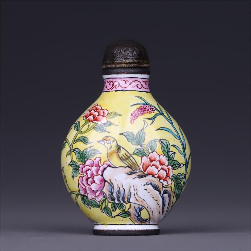 A copper tire painting enamel flower and bird pattern snuff bottle made in the Qianlong period of (1 of 10)
