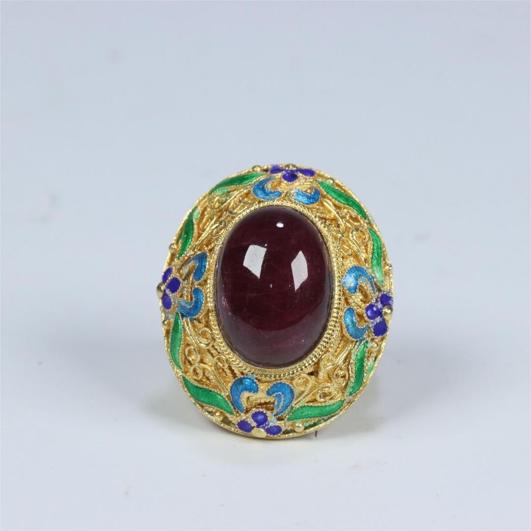A Qing Dynasty silver-gilt filigree tourmaline ring: Qing Dynasty silver-gilt filigree inlaid tourmaline ring Size:Outsidediameter:3.48x5.8lnsidediameter:1.83cmRingface:1.73x1.28cmW:0.0154kg (The Dimensions Of All Batches Are