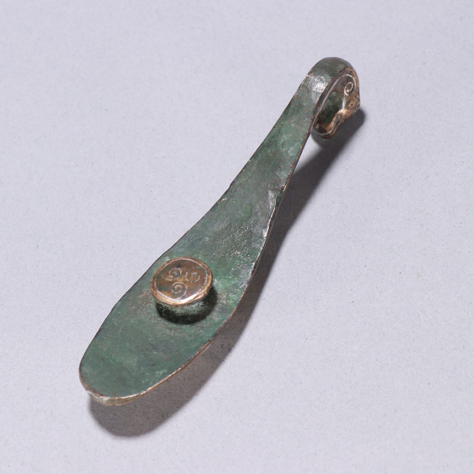 A fine copper wrong gold and silver strap hook - 8