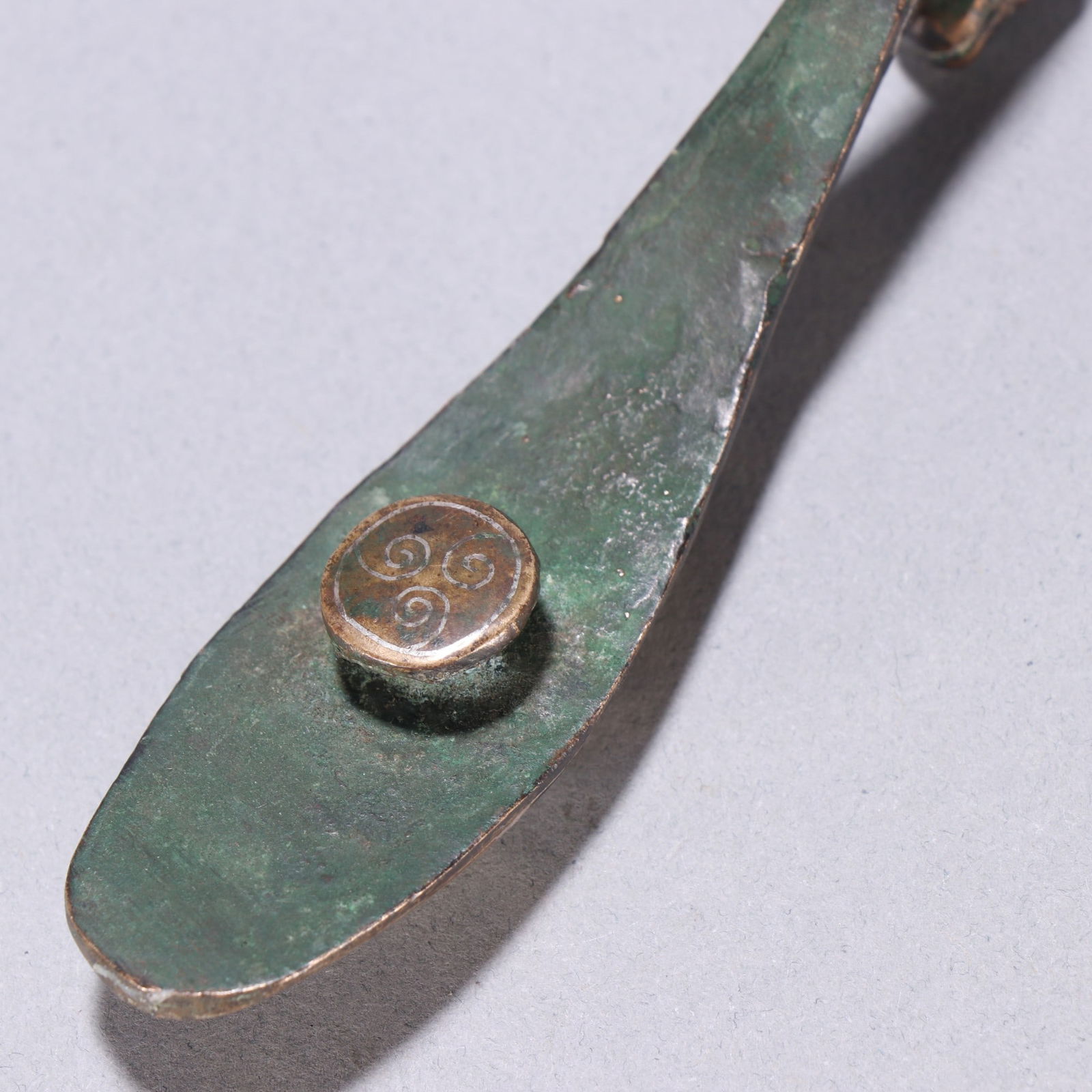 A fine copper wrong gold and silver strap hook - 9