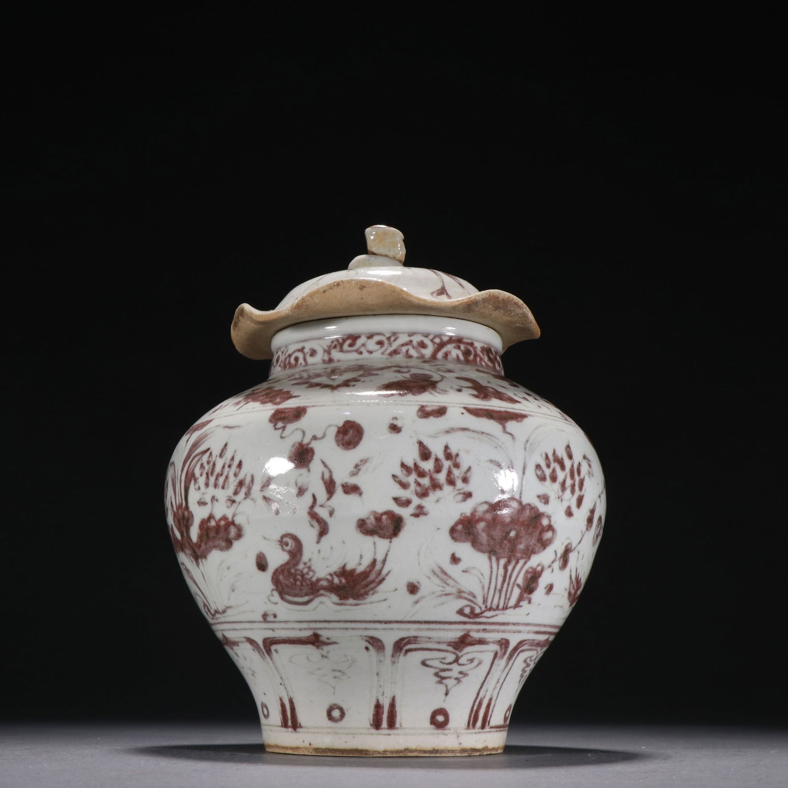 A beautiful glazed red mandarin duck playing in the water cover jar (1 of 9)