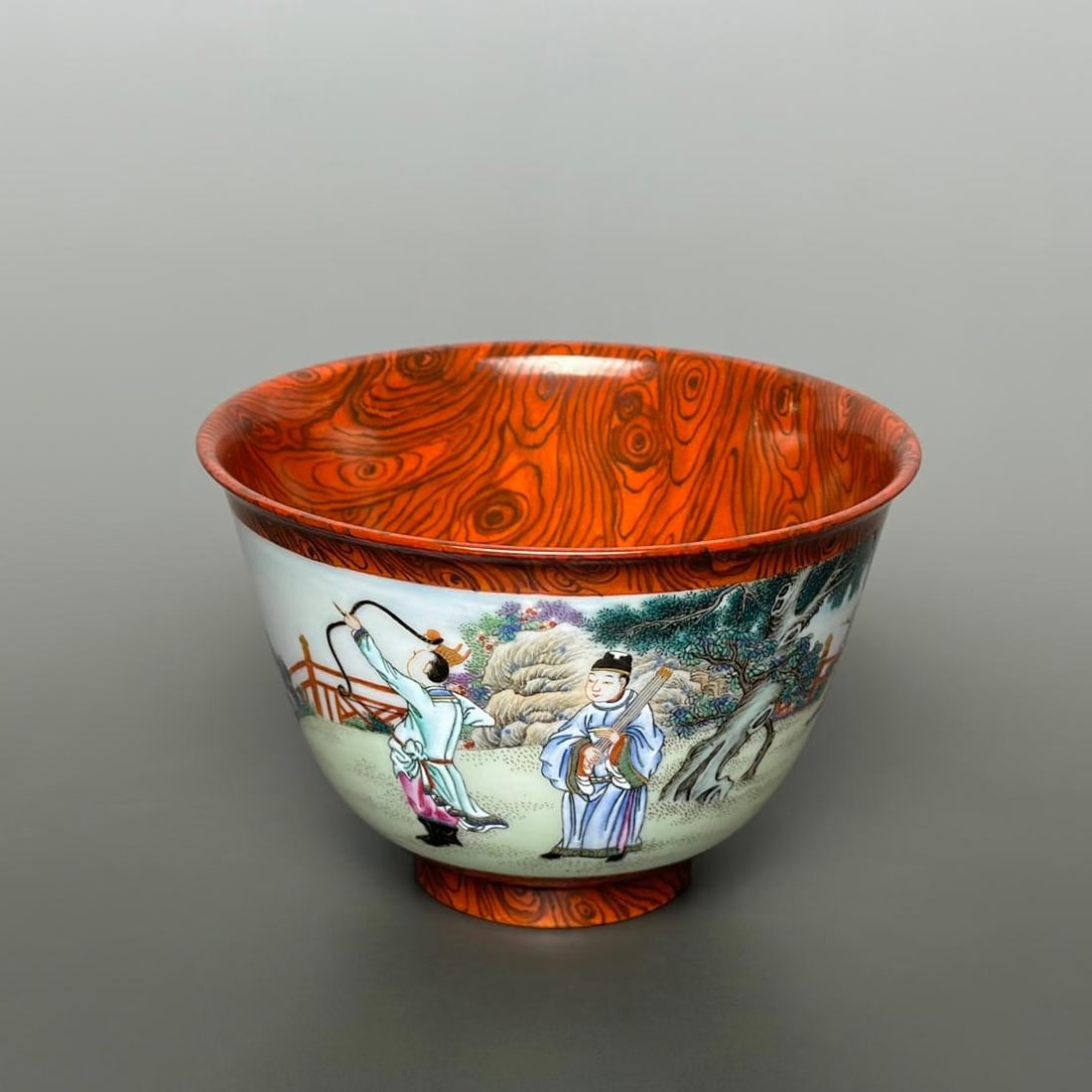 A wood-grain glaze character story teacup made in the Yongzheng year of the Qing Dynasty: Qing Dynasty Yongzheng year wood grain glaze character story tea bowl Size:Calibre:11.3cmH:7.5cmBottom:4.6cm (The Dimensions Of All Batches Are Manually Measured.If You Need More