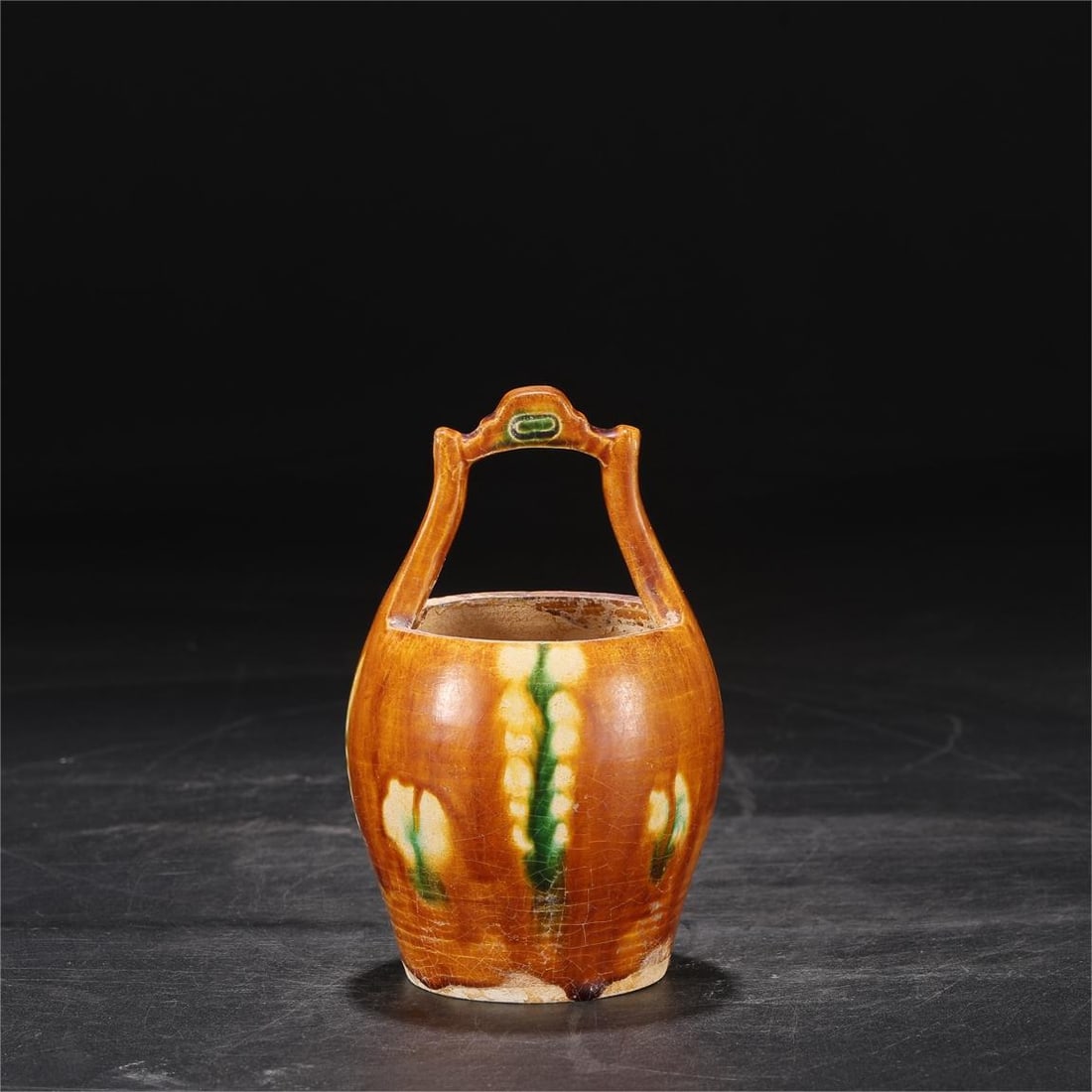 A three-color bucket from the Gongxian kiln in the Tang Dynasty: The three-color bucket of the Gongxian kiln in the Tang Dynasty Size:H:14.5cmCalibre:8cm (The Dimensions Of All Batches Are Manually Measured.If You Need More Detailed Information,