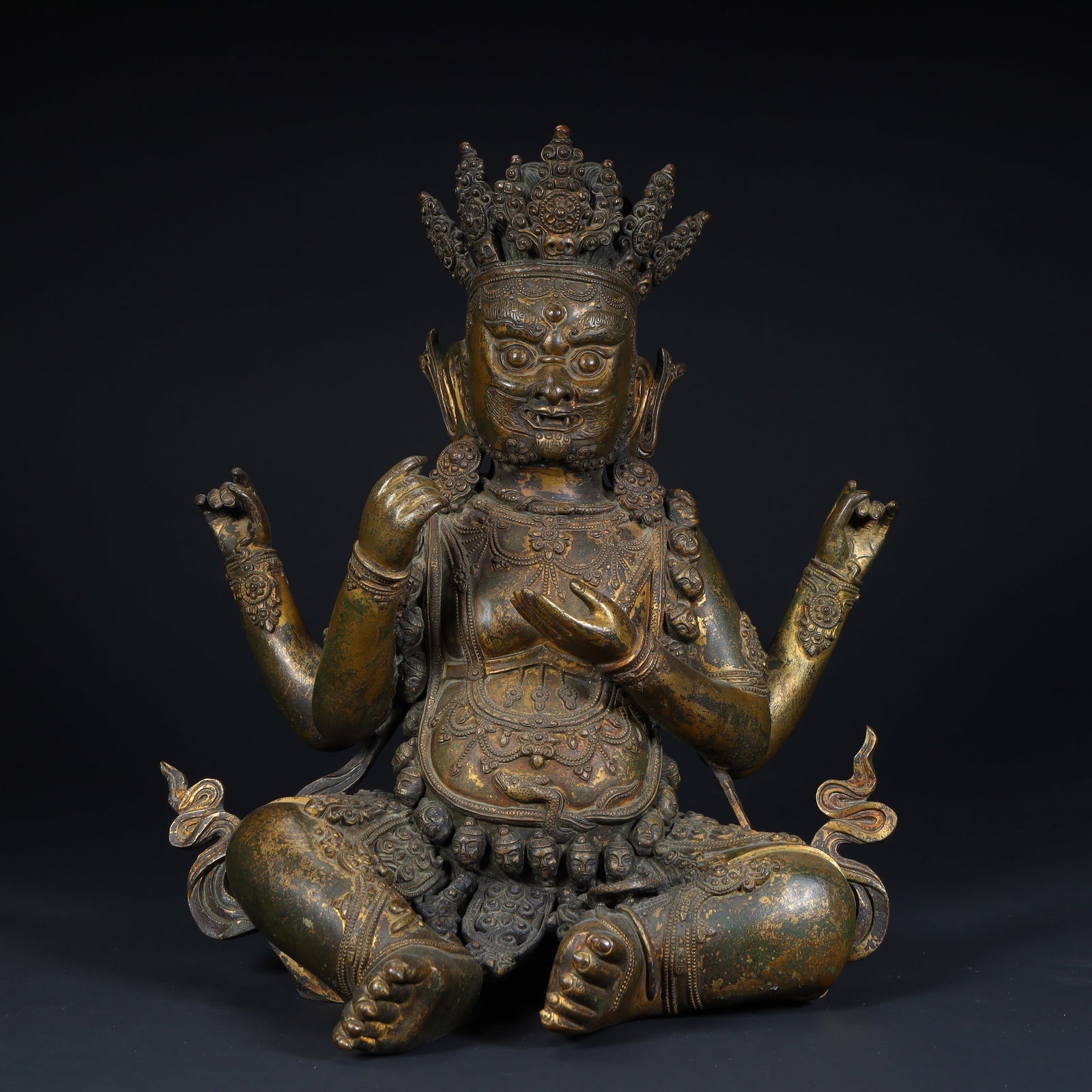 A Qing Dynasty copper gilt four-armed black sky statue: Qing Dynasty bronze gilt four-armed black sky statue Size:H:30cmL: 27cmW:17cmW:7.5kg (The Dimensions Of All Batches Are Manually Measured.If You Need More Detailed Information, Please Contact Our Cust