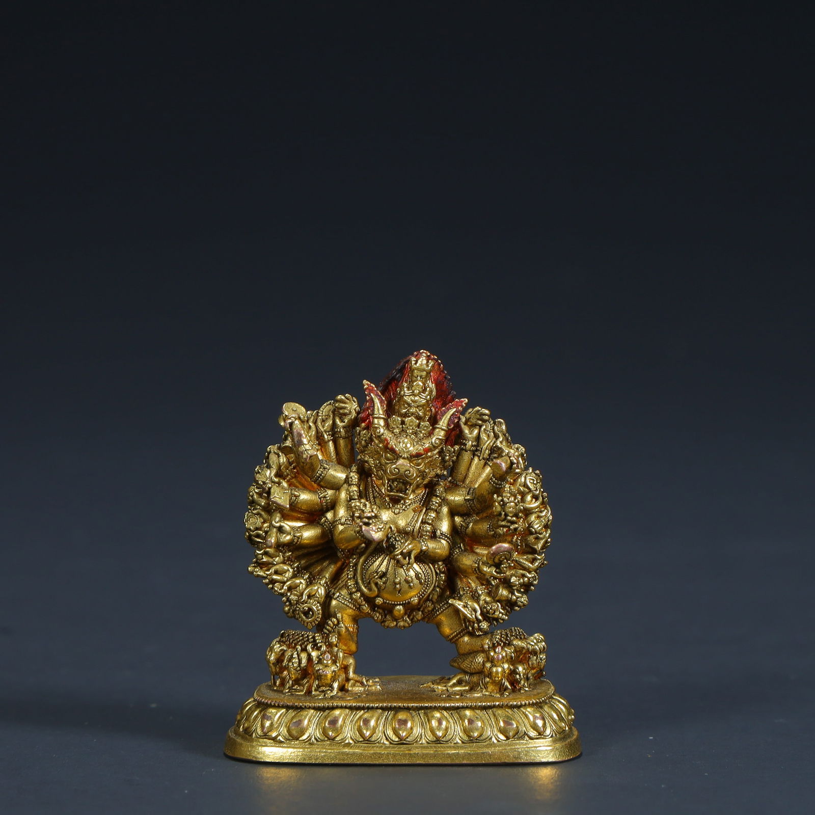A Qing Dynasty bronze gilt statue of Dawei De Vajra: Qing Dynasty bronze gilt Dawei De Vajra statue Size:H:4cmL: 3.5cmW:1.8cmW:29.6g (The Dimensions Of All Batches Are Manually Measured.If You Need More Detailed Information, Please