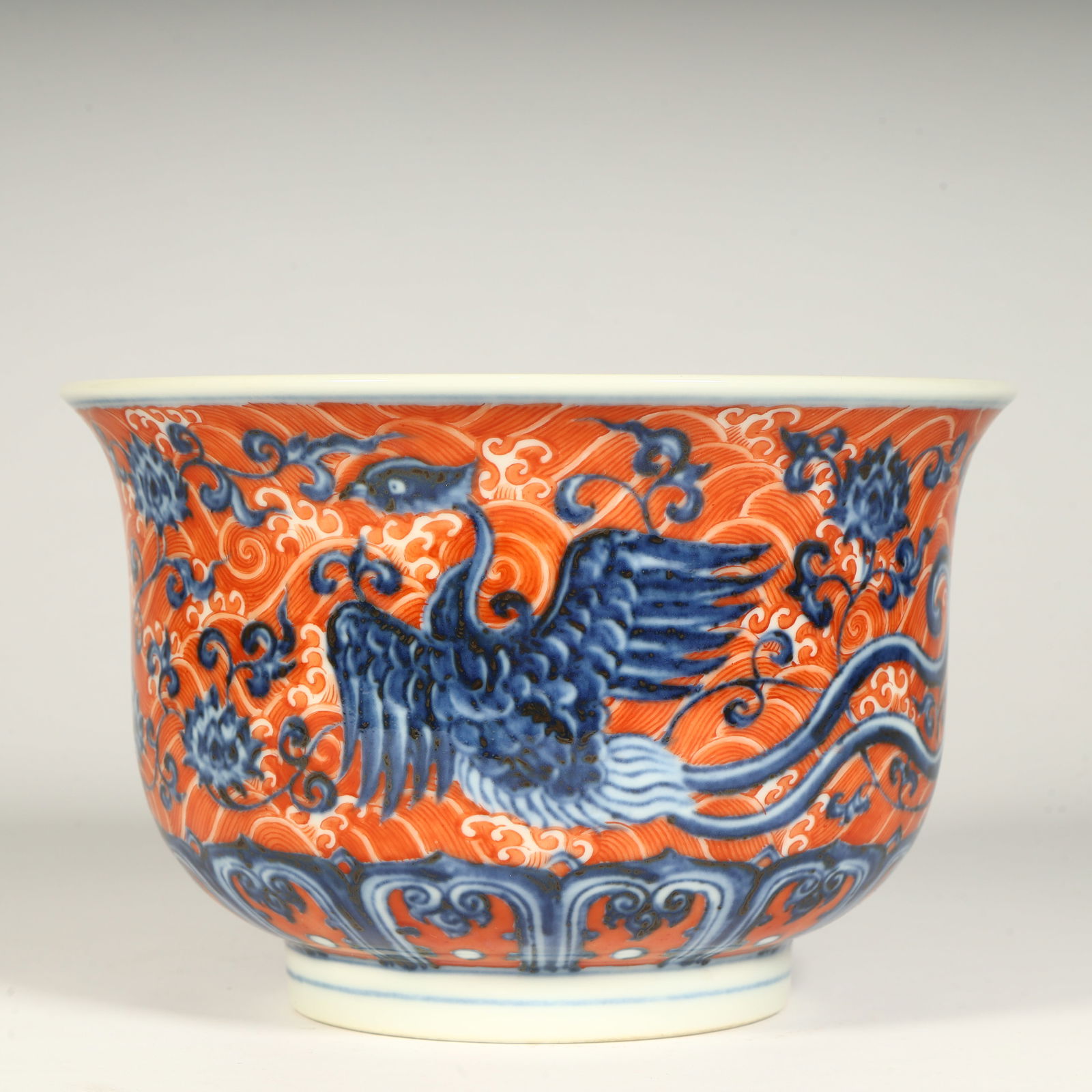 A blue and white alum red seawater phoenix pattern bowl from the Xuande period of the Ming Dynasty (1 of 9)
