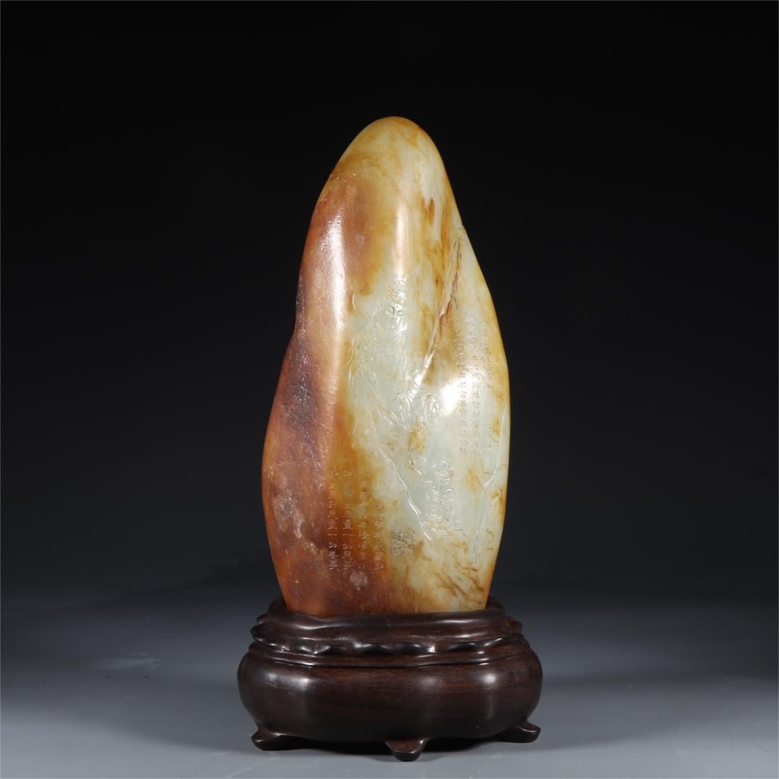 A Qing Dynasty Hetian jade Bodhisattva picture engraving rough stone: The original stone of the Hetian jade Bodhisattva picture of the Qing Dynasty Size:L:12.8cmW:8.8cmH:30cmW:5075g (The Dimensions Of All Batches Are Manually Measured.If You Need More Detailed Informati