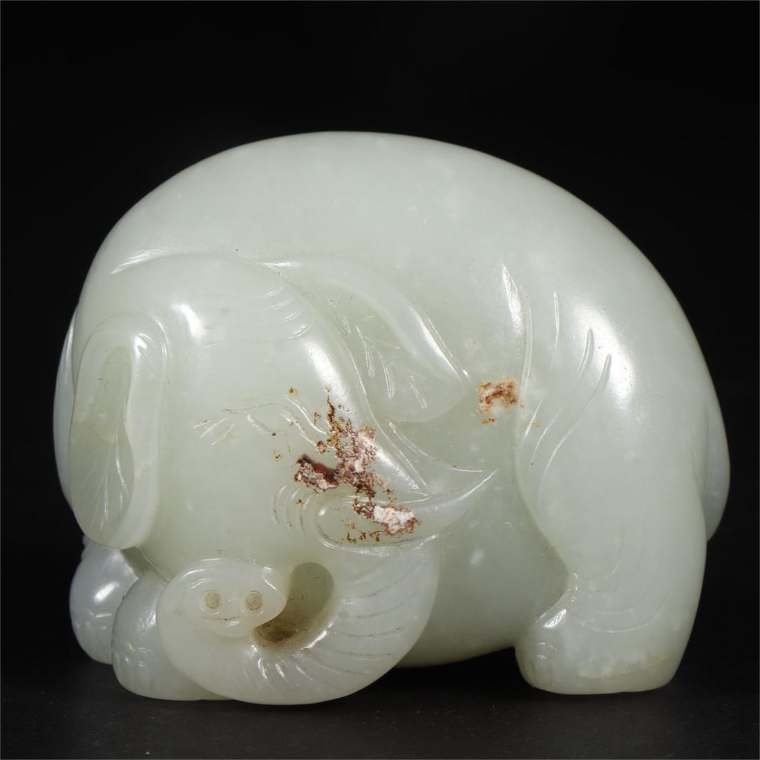 A Qing Dynasty Hetian jade seed elephant (1 of 8)