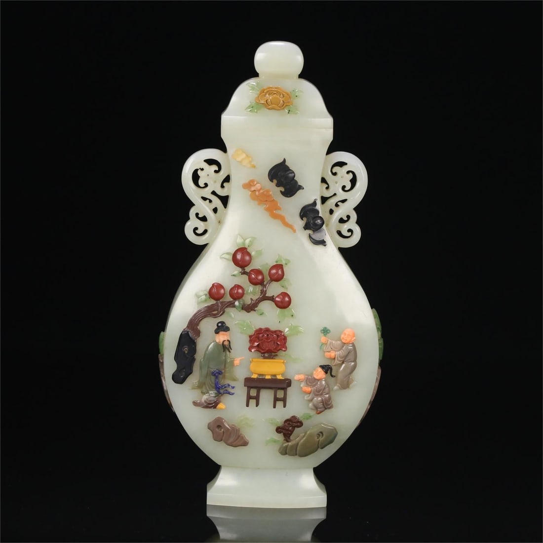 A Hetian jade hundred treasures inlaid with character story lid bottles made in the Qianlong era of: Qing Dynasty Qianlong year system Hetian jade hundred treasure inlaid character story lid bottle Size:19.3x9.4x4.5cmW:0.3662kg (The Dimensions Of All Batches Are Manually Measured.If You Need More Det