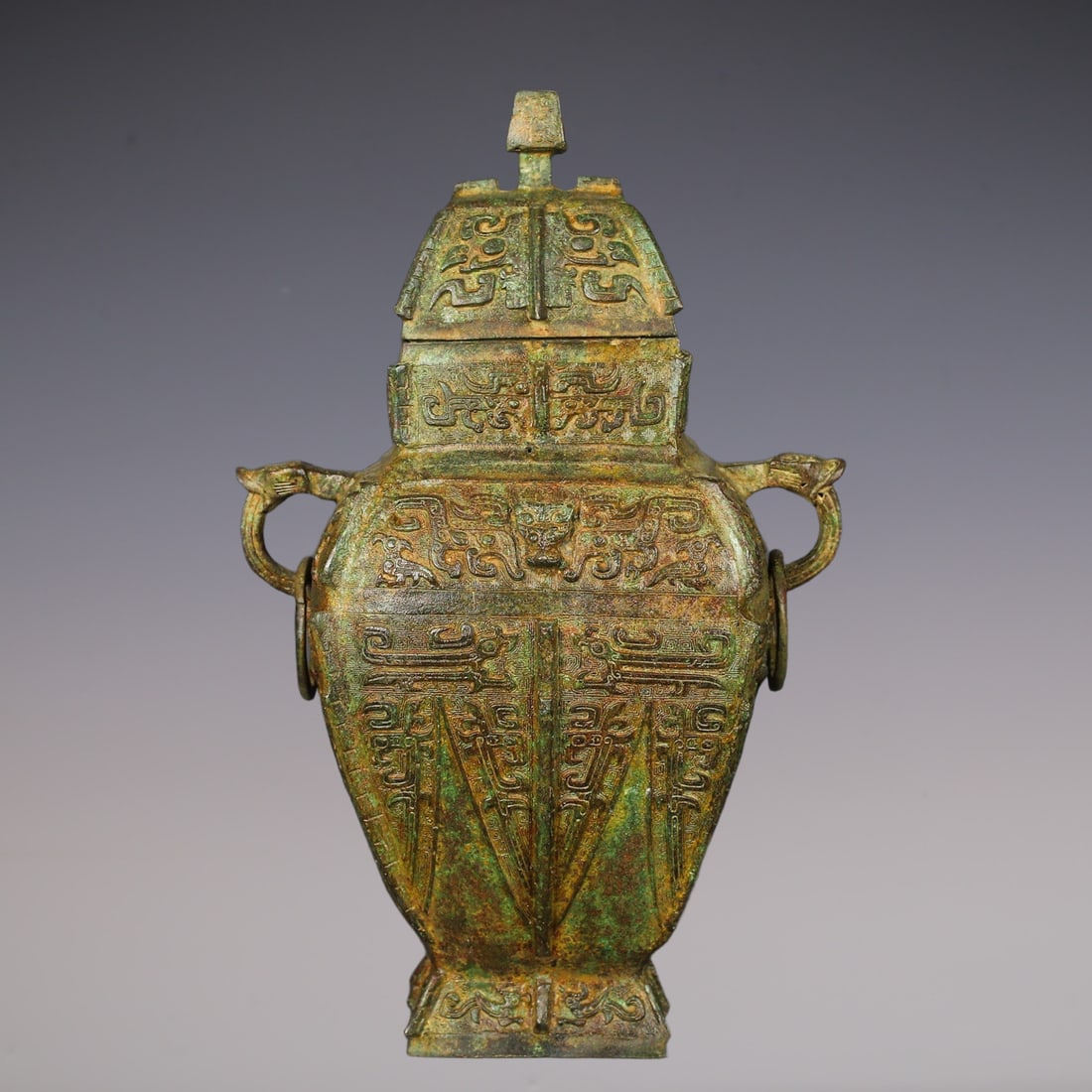 An Exquisite Bronze Beast-Face Pattern Double-Ears Vase: An Exquisite Bronze Beast-Face Pattern Double-Ears Vase W.Zhou , China Size:23cmx36cm Weight:3950g (The Dimensions Of All Batches Are Manually Measured.If You Need More Detailed Information, Please Co