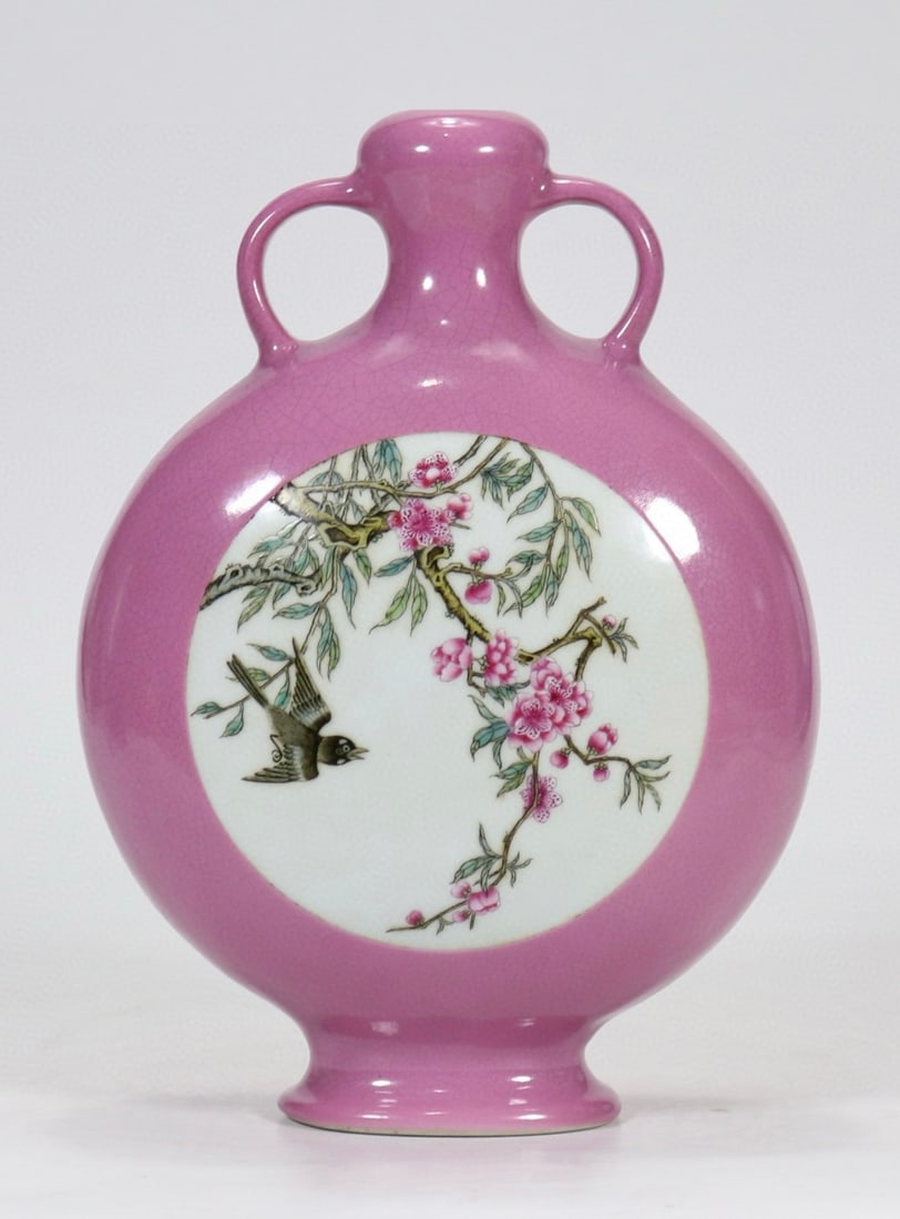 An Exquisite Famille-Rose Flower and Bird Pattern Double-Ears Vase: An Exquisite Famille-Rose Flower and Bird Pattern Double-Ears Vase Qing Dynasty, China Qianlong Six-character Mark Size:23.6cmx17cm (The Dimensions Of All Batches Are Manually Measured.If You Need