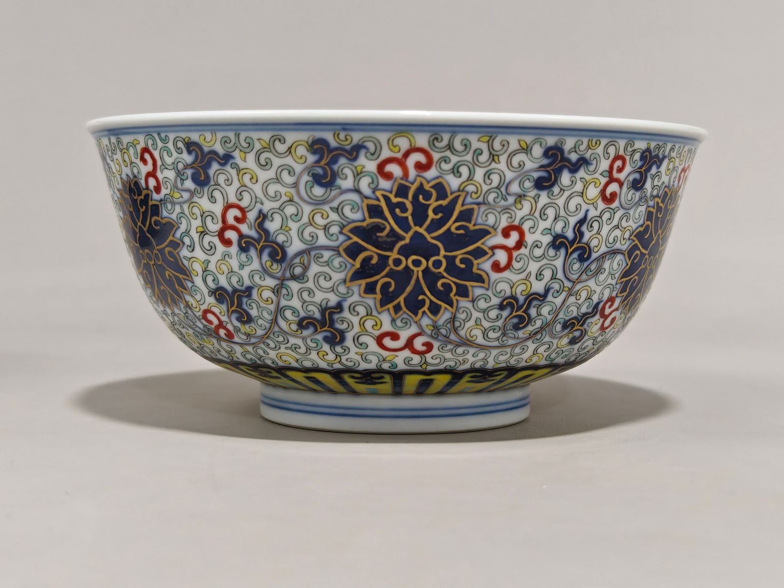 An Exquisite Doucai Painted Gold Lotus Pattern Bowl: An Exquisite Doucai Painted Gold Lotus Pattern Bowl Qing Dynasty, China Guangxu Six-character Mark Size:7.8cmx16.6cm (The Dimensions Of All Batches Are Manually Measured.If You Need More Detailed Info