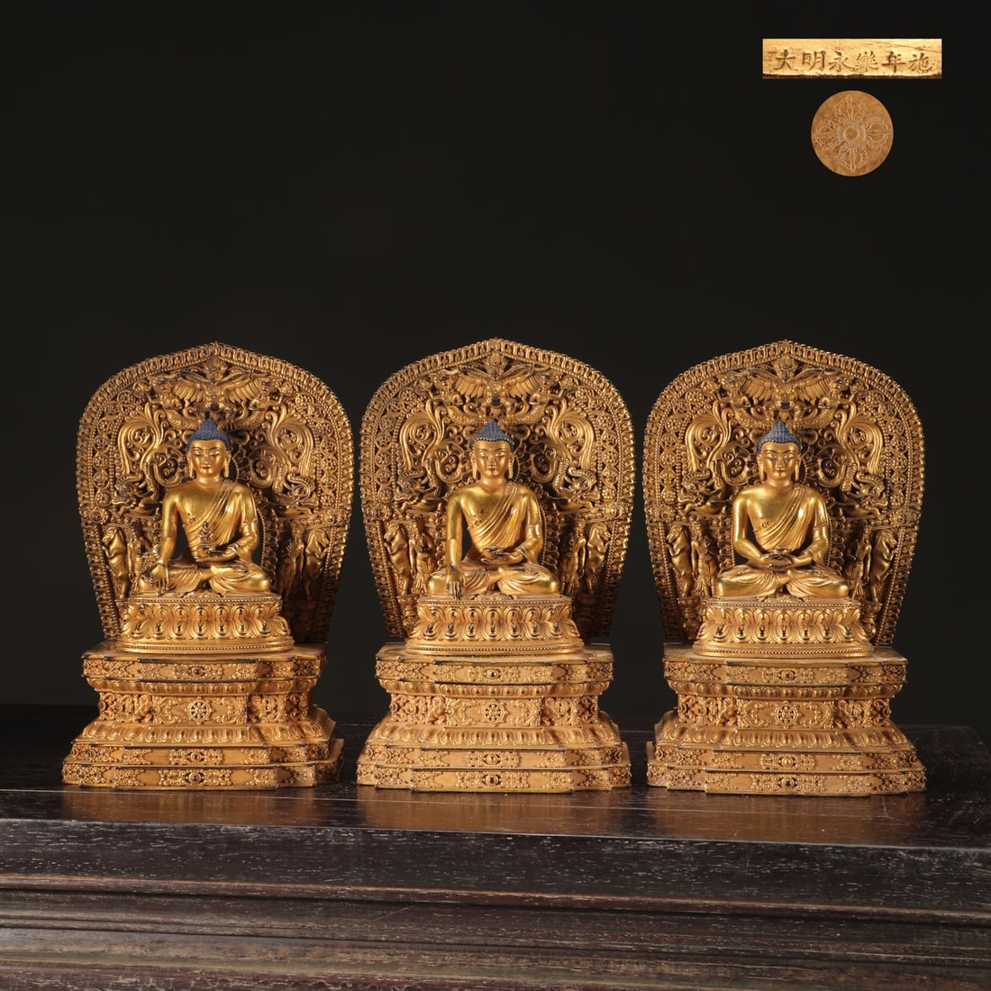 A Set of Fine Gilt Bronze Buddha Statue: A Set of Fine Gilt Bronze Buddha Statue Ming Dynasty, China Yongle Six-character Mark Size:18.8cmx12.3cm Weight:1300g (The Dimensions Of All Batches Are Manually Measured.If You Need More Detailed