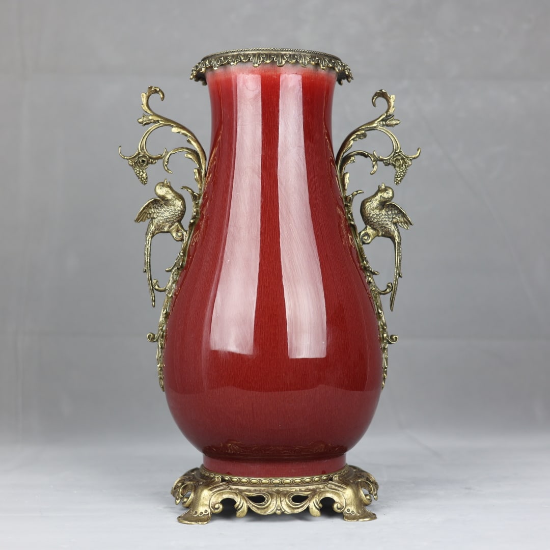 An Exquisite Red Glazed Inlaid Bronze Double-Ears Vase: An Exquisite Red Glazed Inlaid Bronze Double-Ears Vase Qing Dynasty, China Qianlong Six-character Mark Size:43cmx27cm (The Dimensions Of All Batches Are Manually Measured.If You Need More Detailed Inf