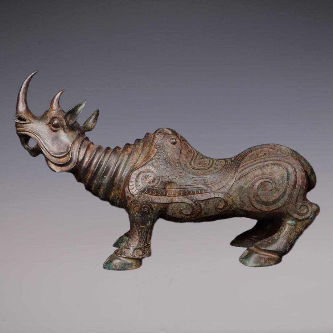 An Exquisite Bronze Phoenix Pattern Rhinoceros Ornament (1 of 9)