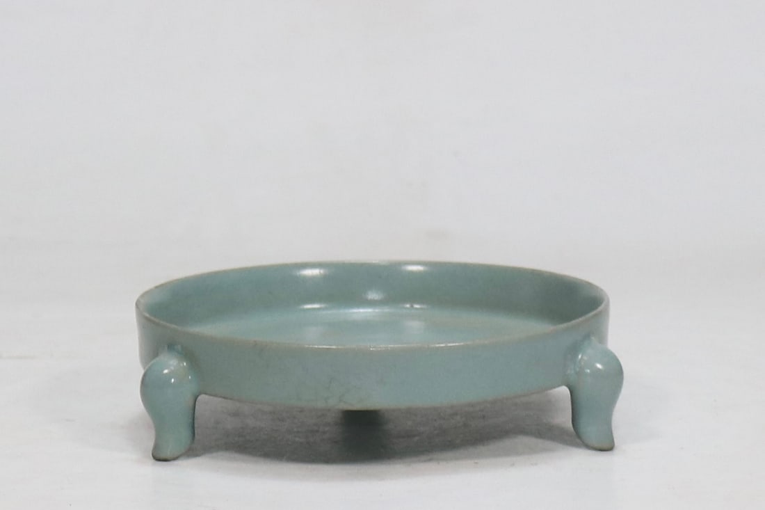 An Exquisite Ru yao Sky Blue Glazed Tripod Censer: An Exquisite Ru yao Sky Blue Glazed Tripod Censer Song Dynasty, China Size:4cmx14.3cm (The Dimensions Of All Batches Are Manually Measured.If You Need More Detailed Information, Please Contact Our
