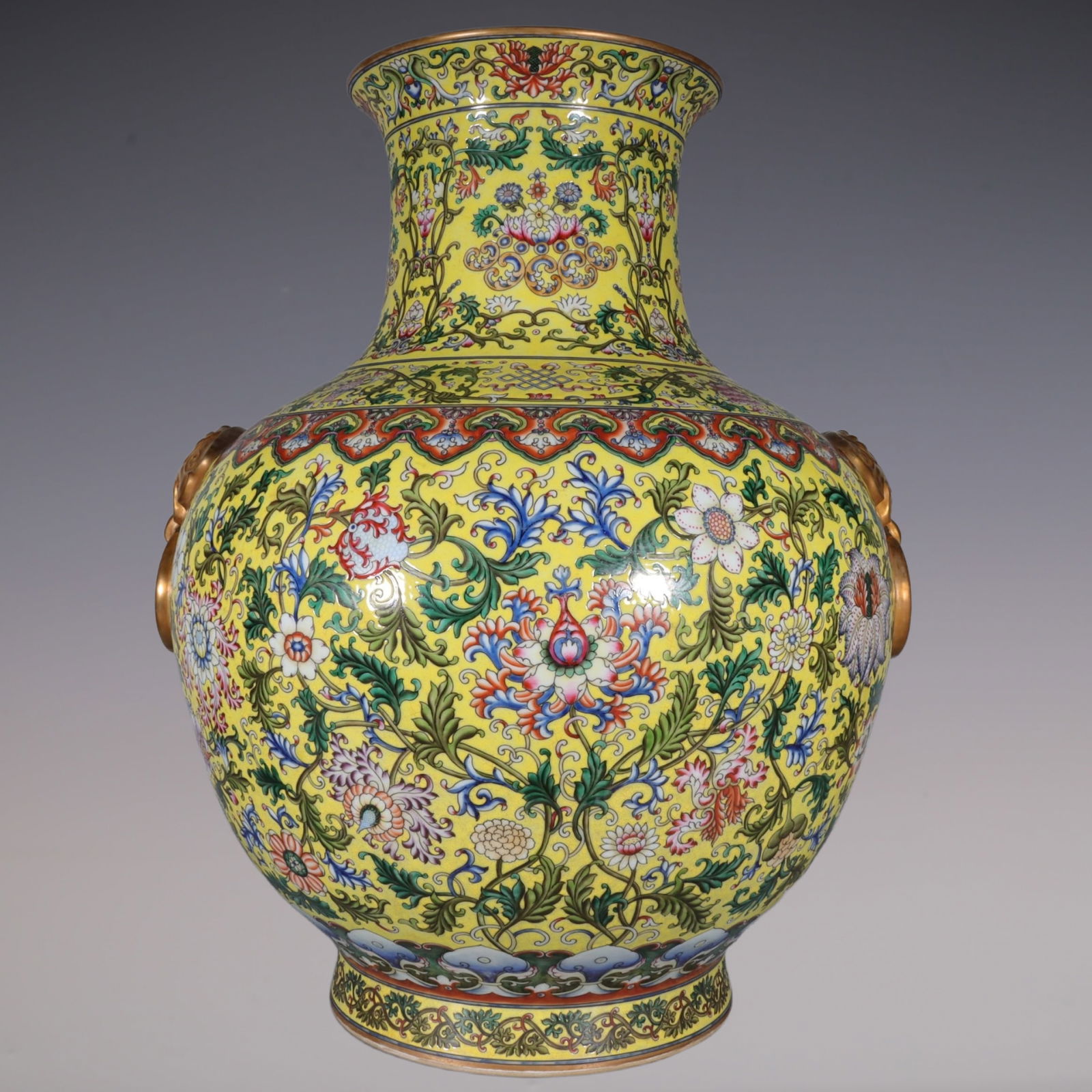 An Exquisite Famille-Rose Painted Gold Lotus Pattern Double-Ears Vase: An Exquisite Famille-Rose Painted Gold Lotus Pattern Double-Ears Vase Qing Dynasty, China Qianlong Six-character Mark Size:60.5cm (The Dimensions Of All Batches Are Manually Measured.If You Need More