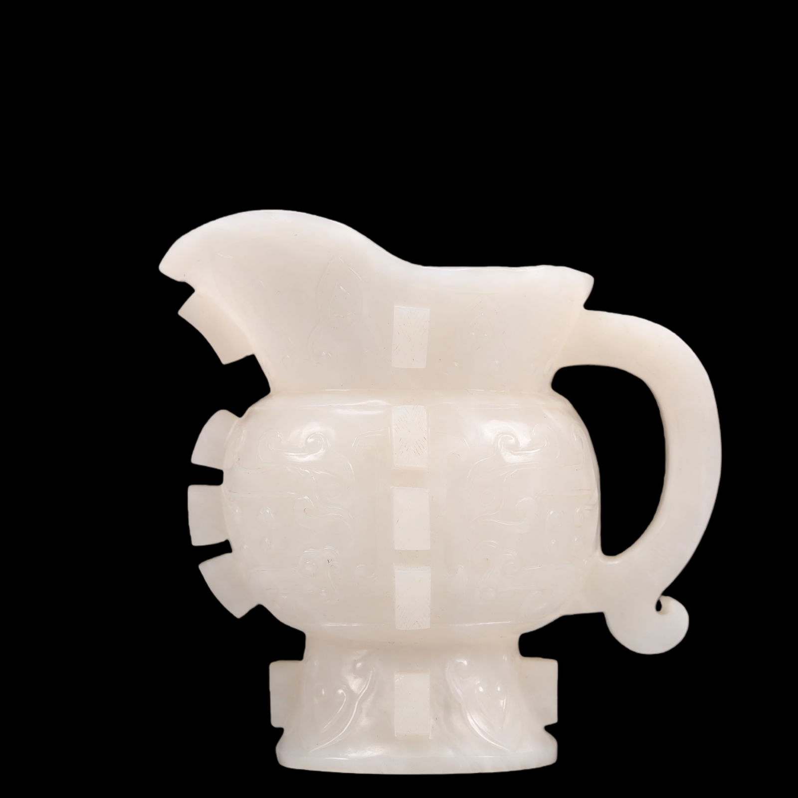 An Exquisite White Jade Beast-Face Pattern Goblet: An Exquisite White Jade Beast-Face Pattern Goblet Qing Dynasty, China Size:10.5cmx6.5cmx9.5cm Weight:285g (The Dimensions Of All Batches Are Manually Measured.If You Need More Detailed Information, Pl