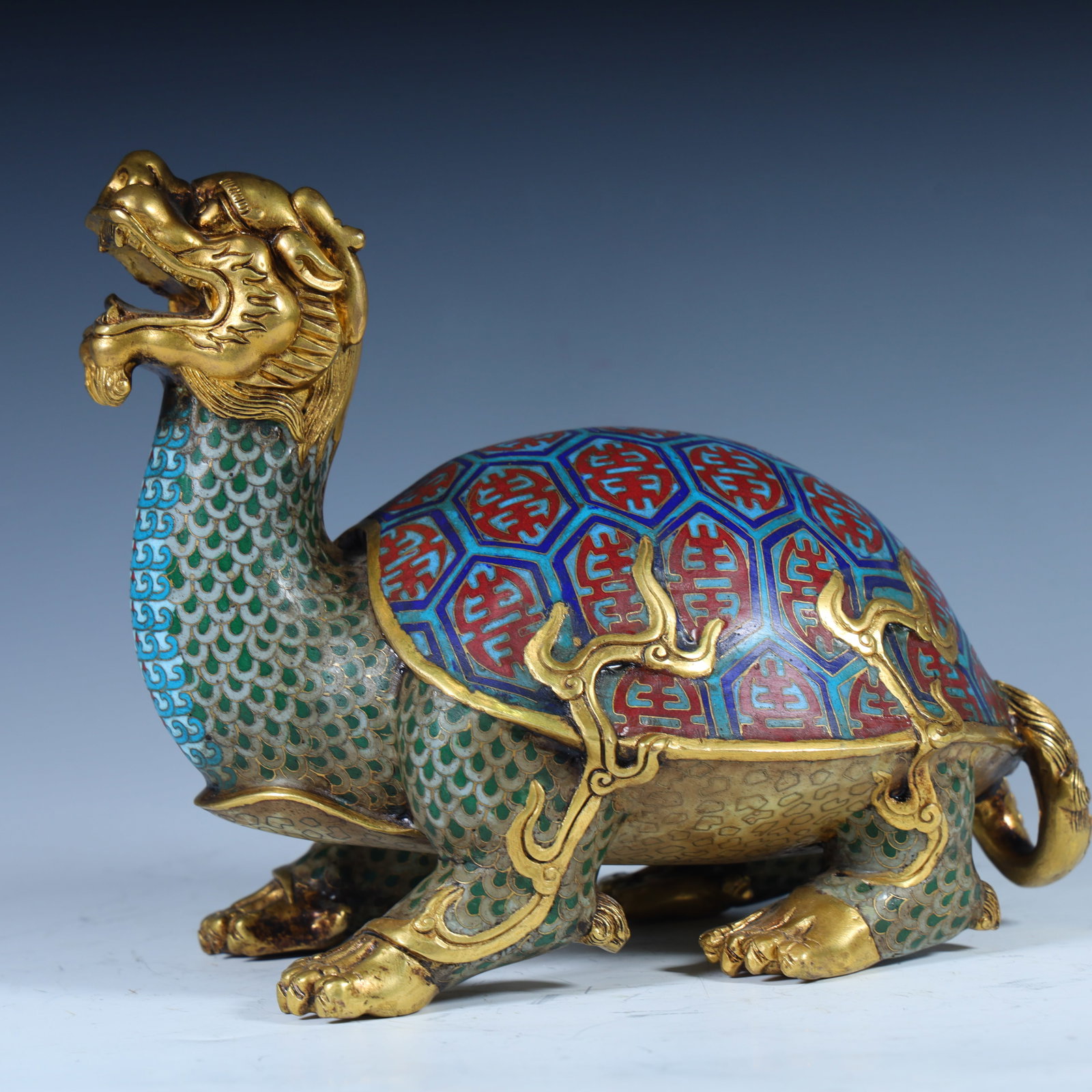 A Qing Dynasty copper-gilt cloisonné blue dragon turtle ornament: Qing Dynasty copper gilt cloisonné blue dragon turtle ornament SIZE: H:17.5cm L:21.5cm W:14cm W:3.3kg (The Dimensions Of All Batches Are Manually Measured.If You Need More Detailed Information, Pleas
