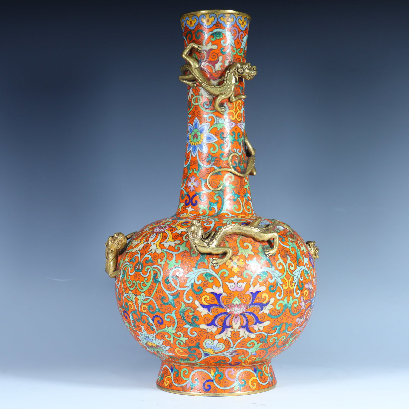 A Qing Dynasty Qianlong cloisonné gilt embossed dragon pattern bottle: Qing Dynasty Qianlong cloisonné gilt relief dragon pattern vase SIZE: H:36.5cm L:20cm W:20cm W:4.3kg (The Dimensions Of All Batches Are Manually Measured.If You Need More Detailed Information, Please