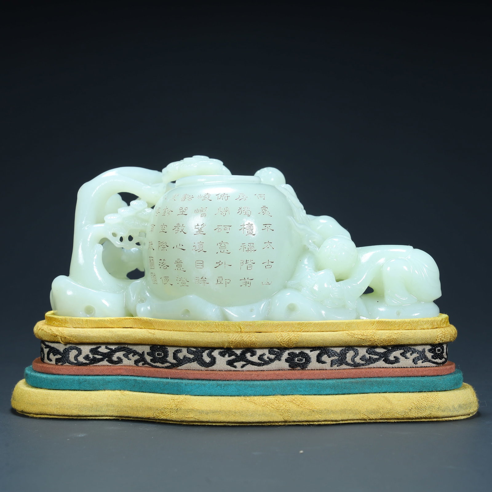 A Qing Dynasty Hetian jade poetry and auspicious beast pattern ornament: Qing Dynasty Hetian jade poetry and auspicious beast pattern ornaments SIZE: H:6.5cm L:15.5cm W:8cm W:659g (The Dimensions Of All Batches Are Manually Measured.If You Need More Detailed Information, P