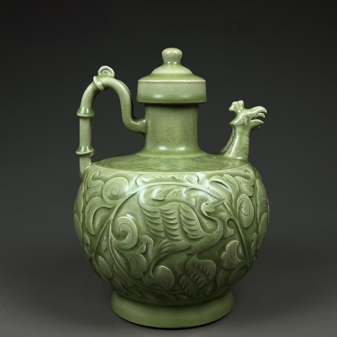 A Song Yaozhou kiln peony crane pattern phoenix head pot: Song Yaozhou kiln peony crane pattern phoenix head pot SIZE: H:25cm D:16.5cm (The Dimensions Of All Batches Are Manually Measured.If You Need More Detailed Information, Please Contact Our Customer Ser