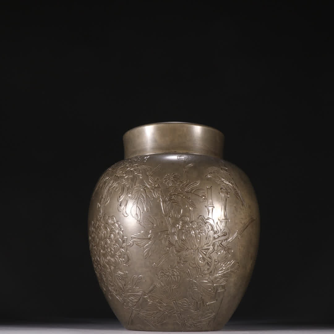 A tin carved chrysanthemum poetry tea jar: Zang Maoju made tin-carved chrysanthemum poetry tea jars SIZE: H:17.5cm W:16.6cm W:1220g (The Dimensions Of All Batches Are Manually Measured.If You Need More Detailed Information, Please Contact Our