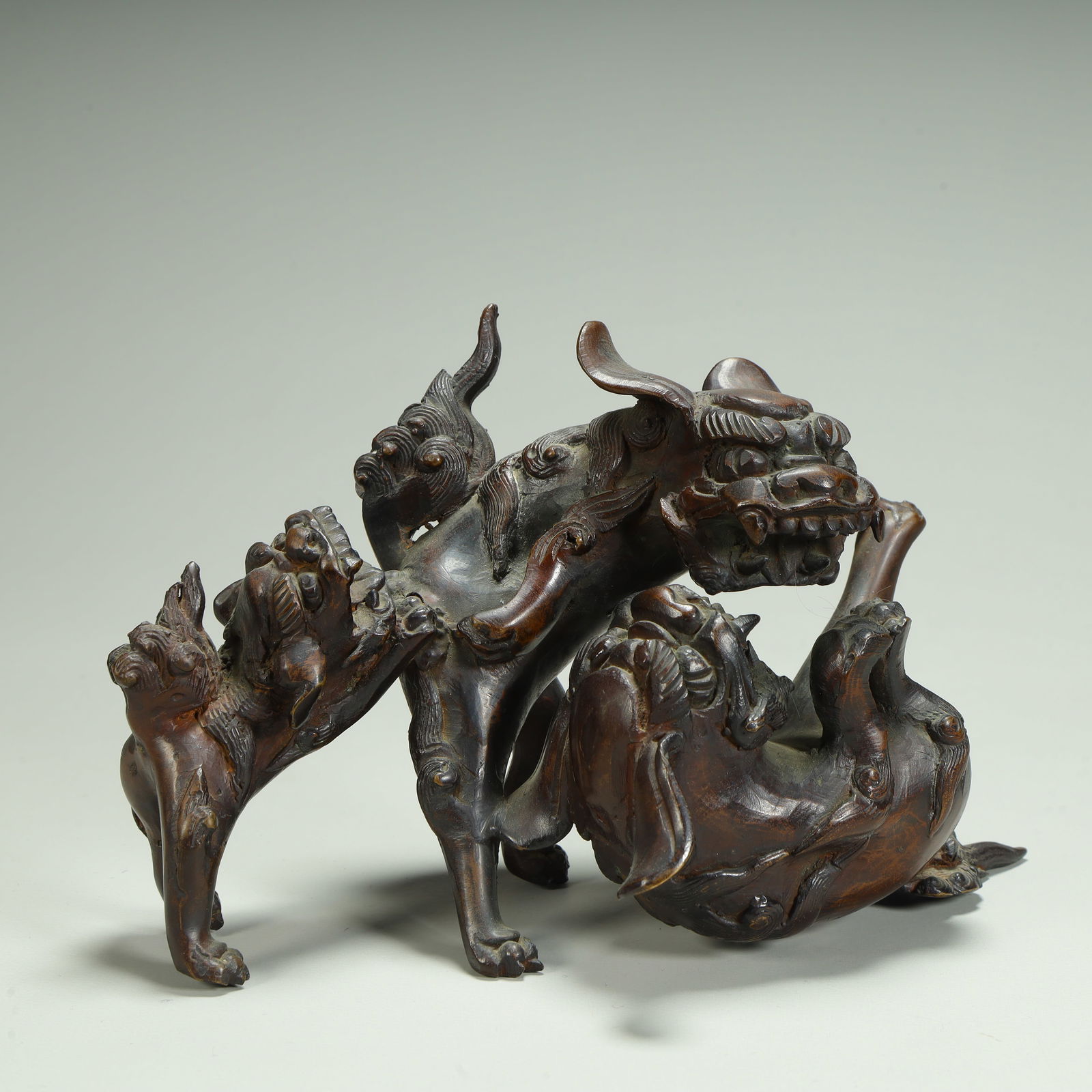 A Qing Dynasty copper beast playing ornament: Qing Dynasty copper beast play ornaments SIZE: H:14cm L:17cm W:9cm W:938g (The Dimensions Of All Batches Are Manually Measured.If You Need More Detailed Information, Please Contact Our Customer Servic