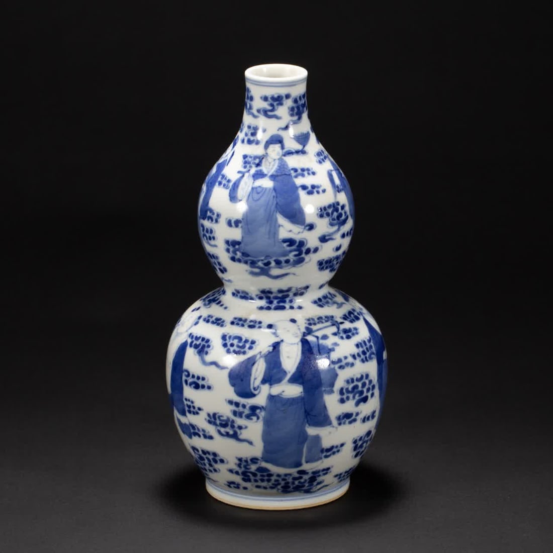A blue and white gourd bottle from the Qing Dynasty: Qing Dynasty blue and white gourd bottle SIZE: L:11cm W:11cm H:22.5cm W:570g (The Dimensions Of All Batches Are Manually Measured.If You Need More Detailed Information, Please Contact Our Customer Ser