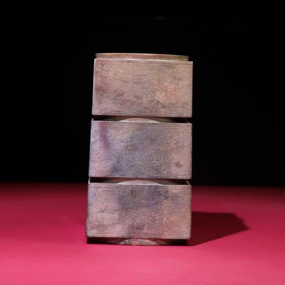 A Han Dynasty white jade clay carved three-layer jade cong: Han Dynasty white jade soil Qinyin carved three-layer jade cong SIZE: 154x85x84mm W:1401g (The Dimensions Of All Batches Are Manually Measured.If You Need More Detailed Information, Please Contact Our