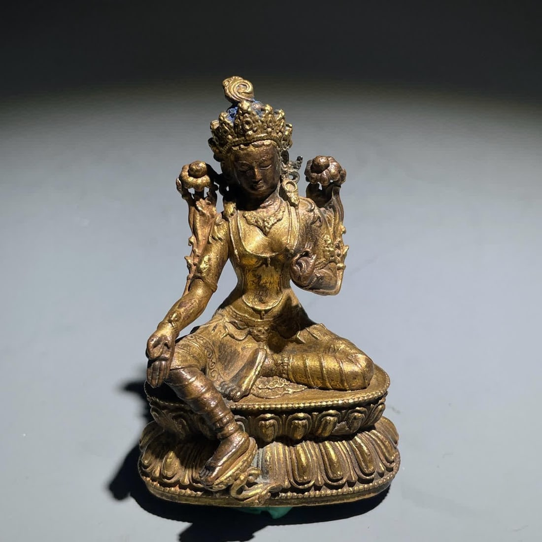 A Qing Dynasty green plated female Buddha: Qing Dynasty green plated mother Buddha SIZE: H:8cm (The Dimensions Of All Batches Are Manually Measured.If You Need More Detailed Information, Please Contact Our Customer Service Before Bidding.)