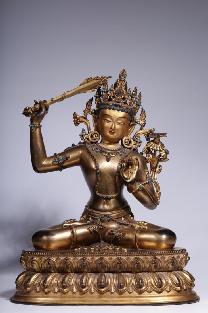 A Qing Dynasty copper-gilt inlaid turquoise statue of Manjushri Bodhisattva: Qing Dynasty copper gilt inlaid turquoise Manjushri Bodhisattva statue SIZE: H:31.5cm L:25cm W:18cm W:4.8kg (The Dimensions Of All Batches Are Manually Measured.If You Need More Detailed Information,