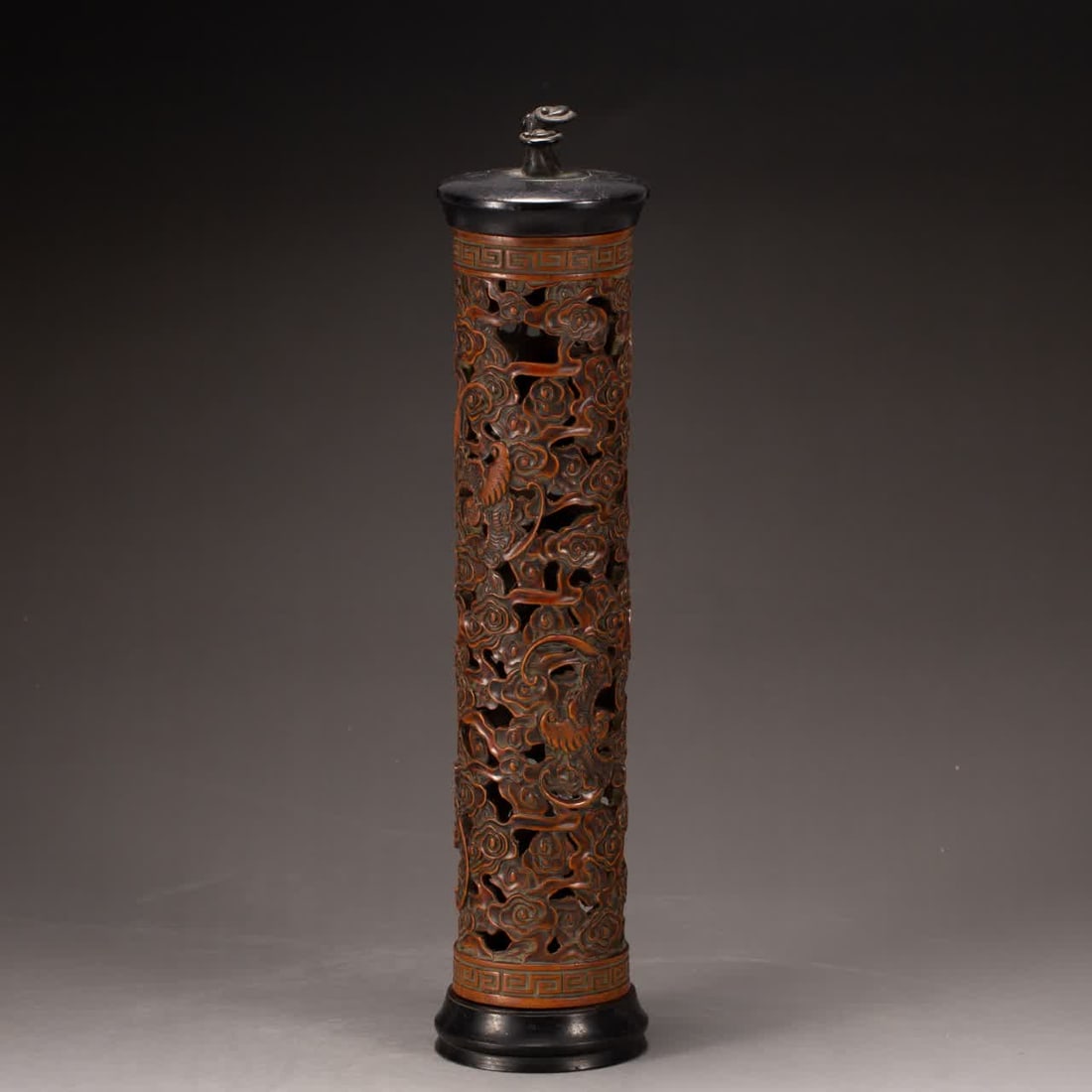 A Qing Dynasty mahogany incense tube (1 of 9)