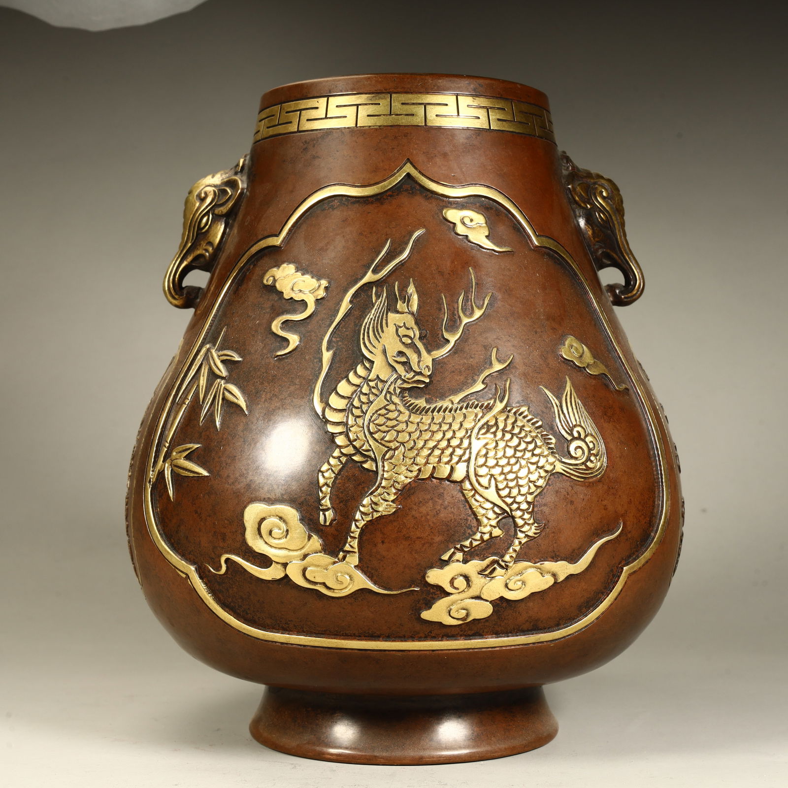 A piece of copper gilt unicorn pattern elephant ear statue: Copper gilt unicorn pattern elephant ear statue SIZE: H:24cm L:19cm W:19cm W:8kg (The Dimensions Of All Batches Are Manually Measured.If You Need More Detailed Information, Please Contact Our Customer