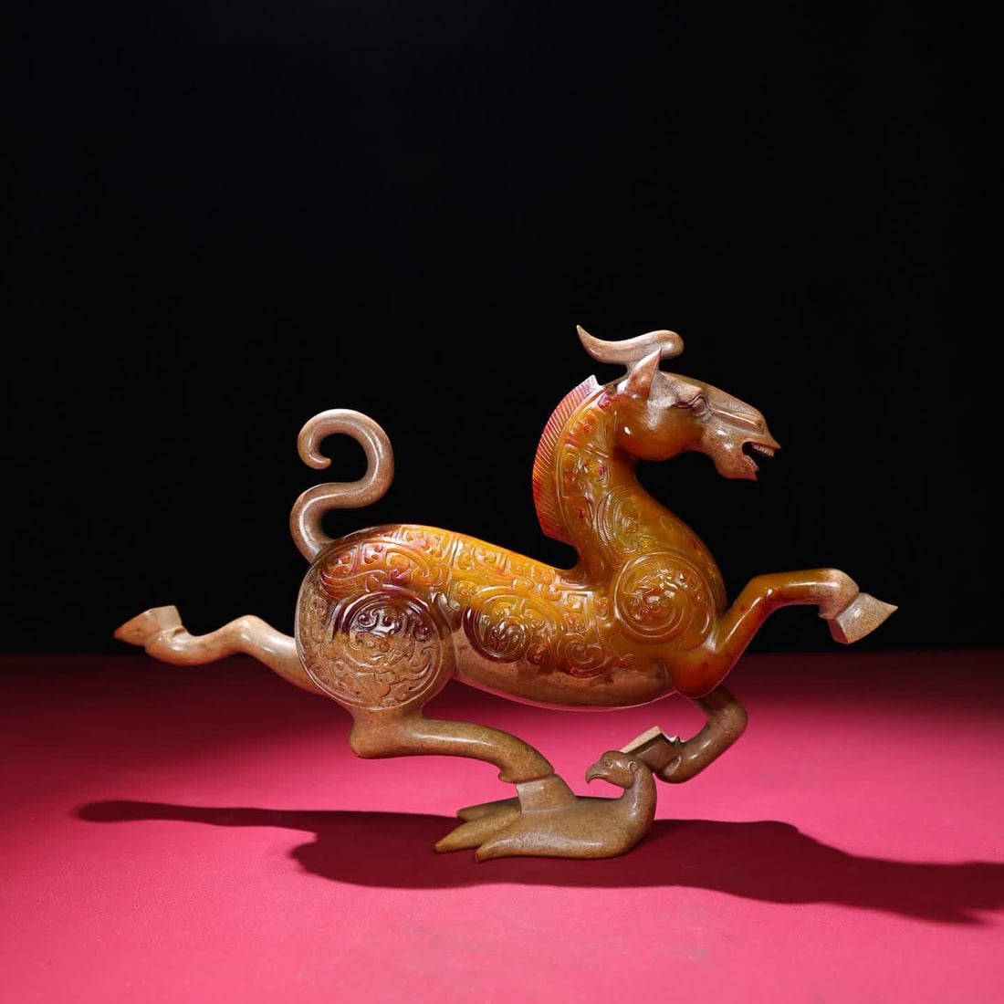 A Han Dynasty jade horse stepping on the flying swallow ornament (1 of 9)