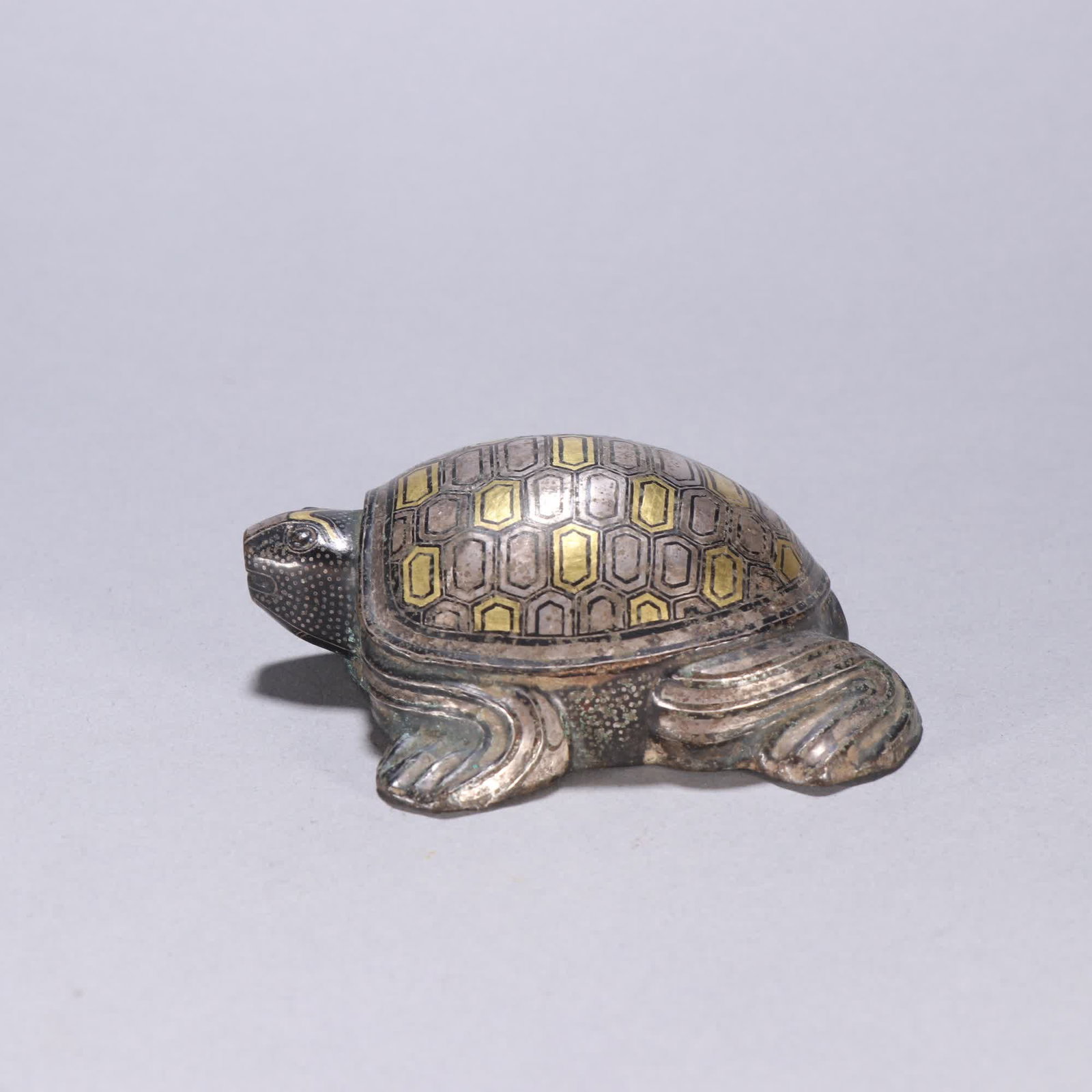 A Han Dynasty copper turtle ornament: Han Dynasty copper turtle gold and silver turtle ornaments SIZE: H:3.2cm W:8.8cm W:240g (The Dimensions Of All Batches Are Manually Measured.If You Need More Detailed Information, Please Contact Our C